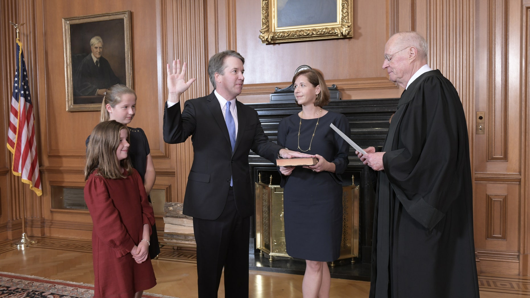 Justice Anthony M. Kennedy, (Retired) administers the Judicial Oath to Judge Brett M. Kavanaugh in the Justices’ Conference Room, Supreme Court Building. Mrs. Ashley Kavanaugh holds the Bible. Credit: Fred Schilling, Collection of the Supreme Court of the United States