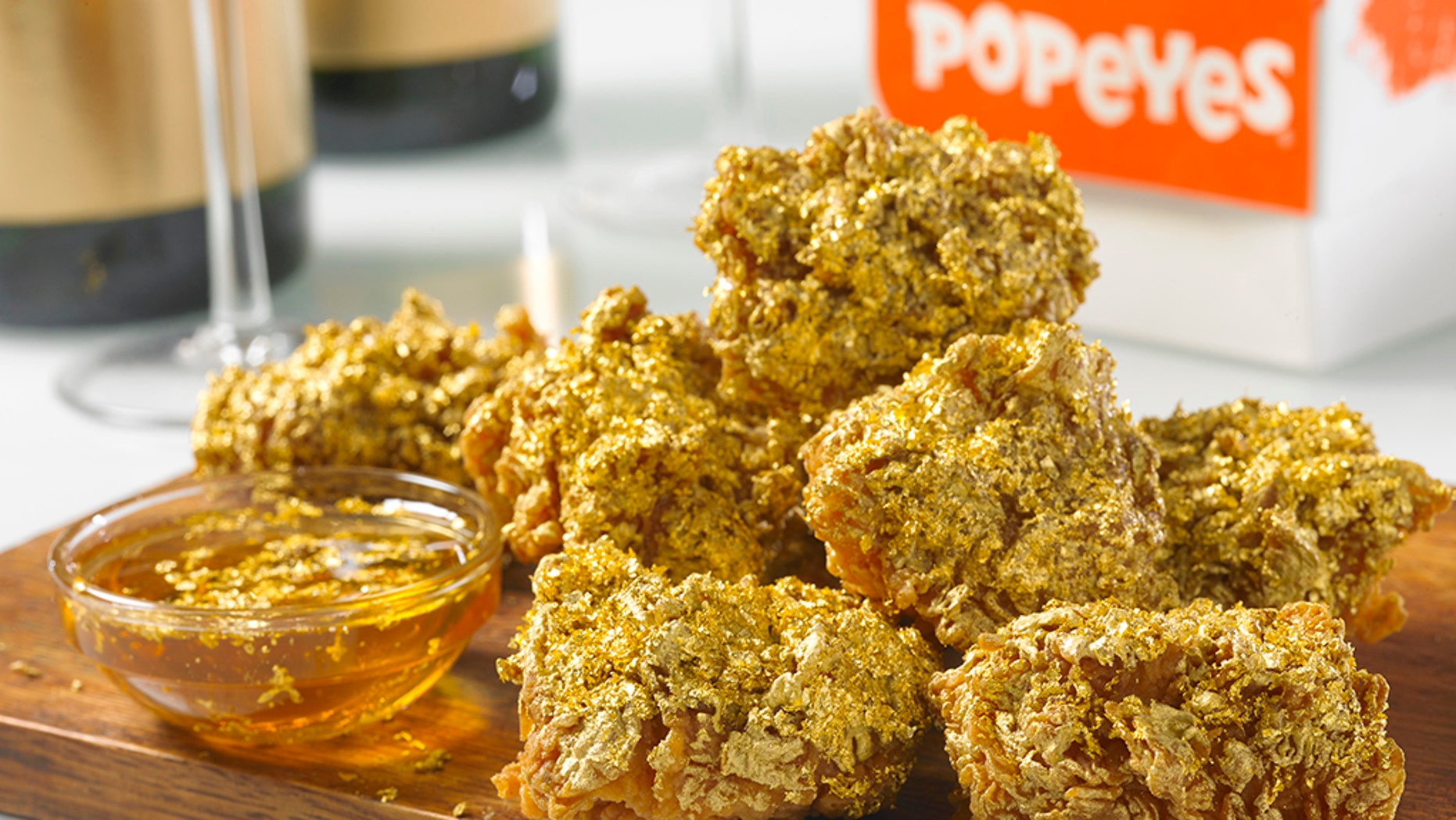 24 Karat Champagne Wings are available at select Popeyes on Thursday