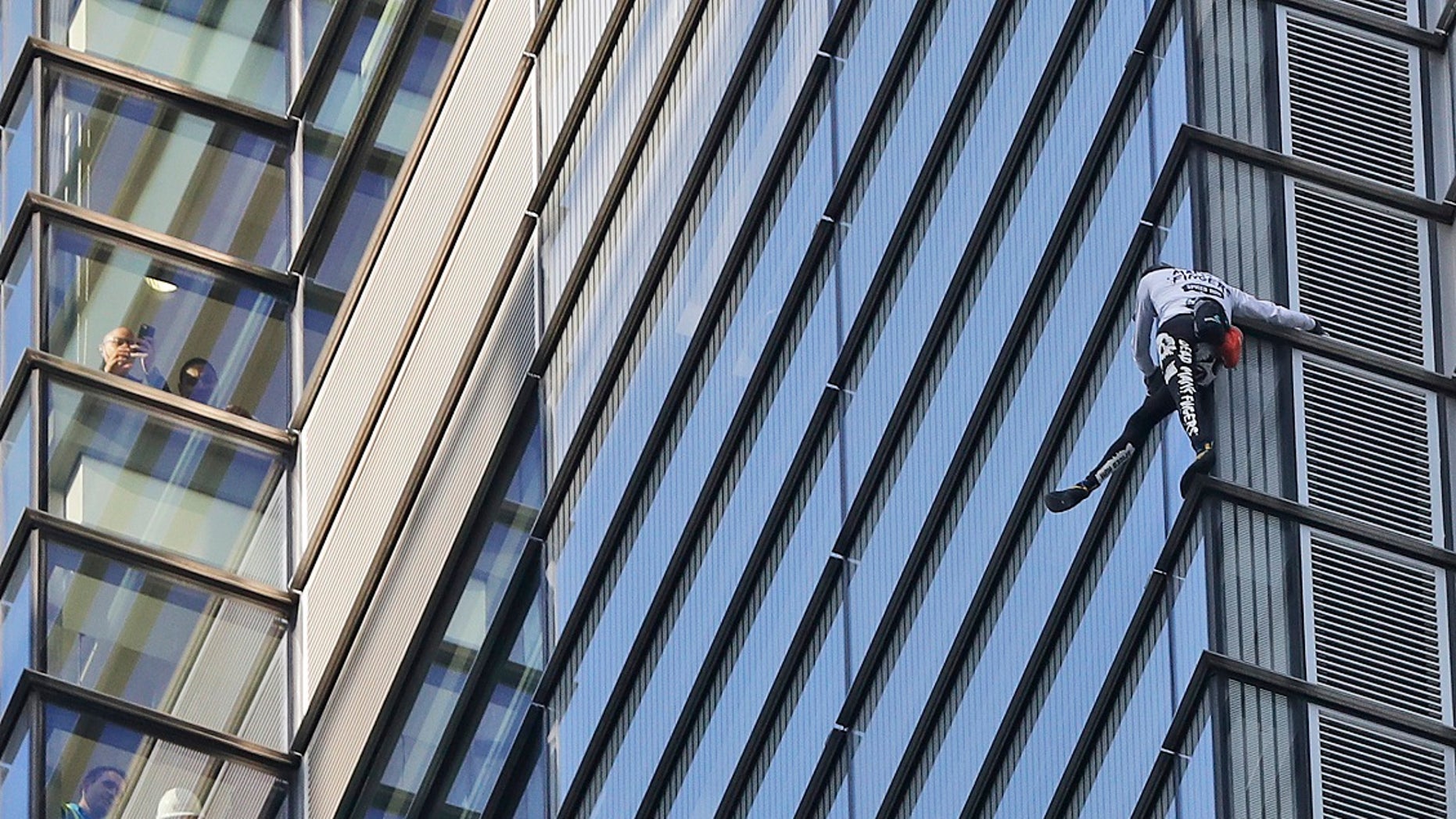 'Real-life Spiderman' climbs one of UK's tallest buildings - without wires
