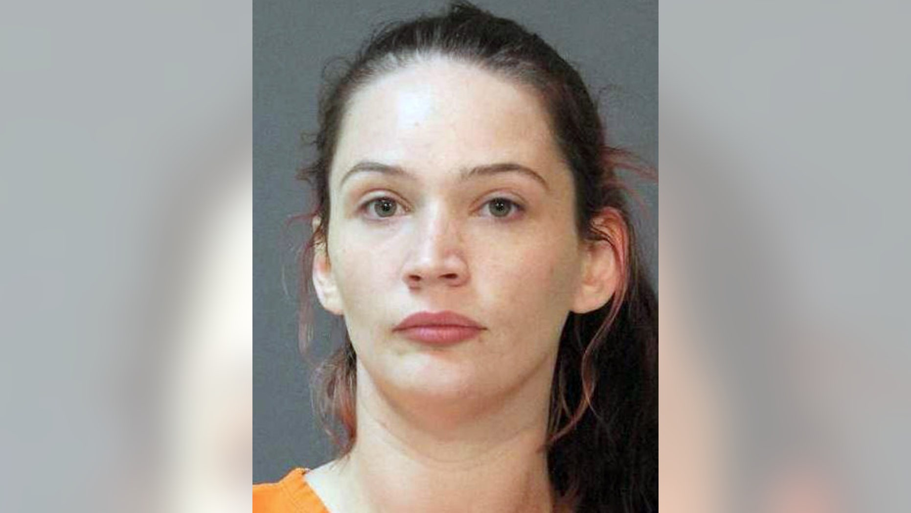 Sarah Parker is accused of failing to report the murder of Logan Kyle's wife.