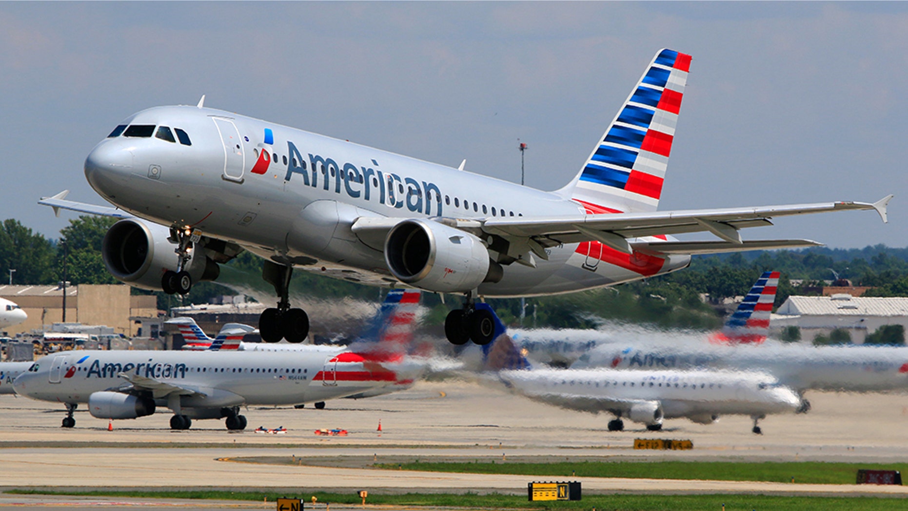 American Airlines spokeswoman Leslie Scott says the e-cigarette's battery overheated.