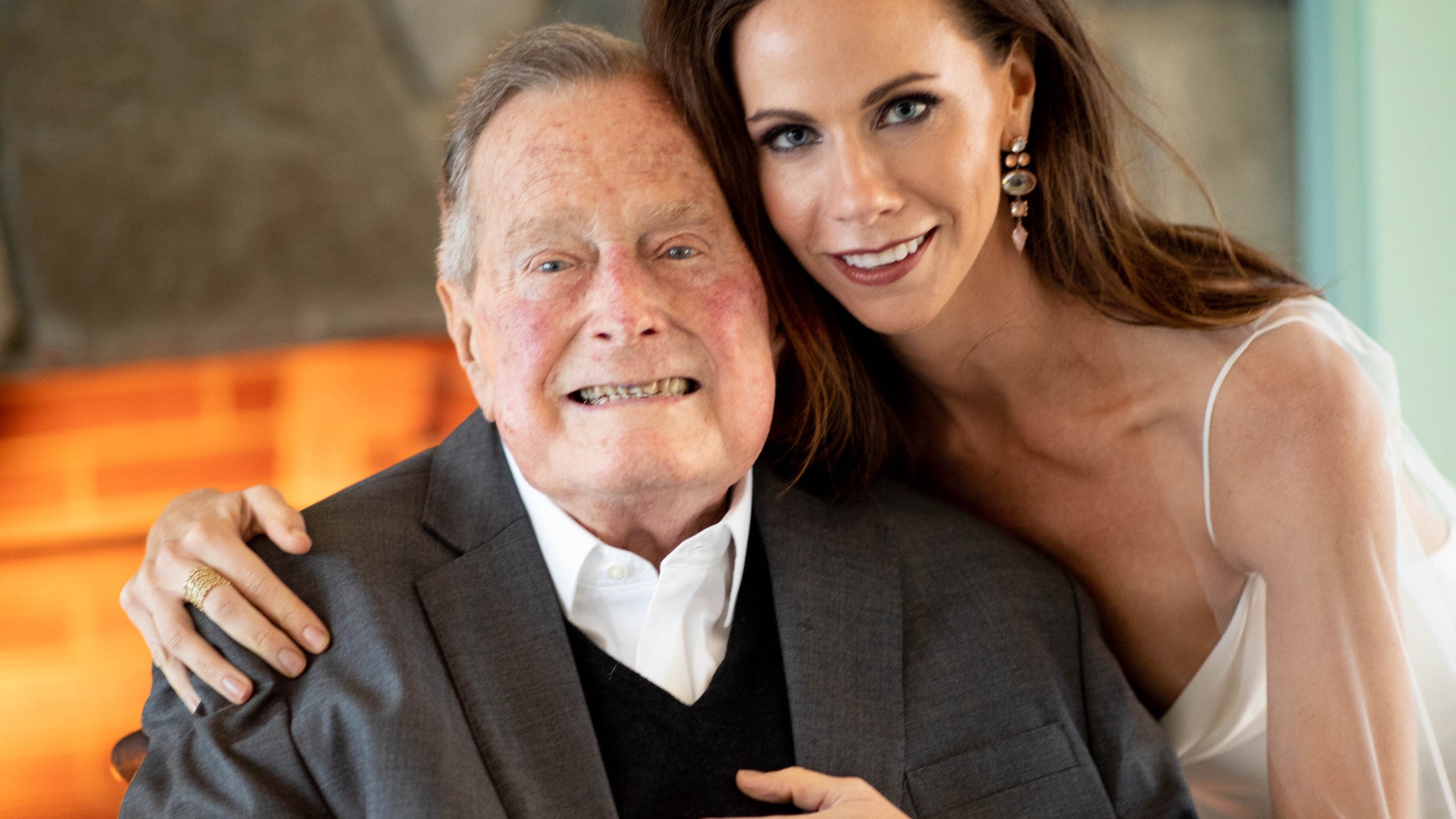 Former president George H. W. Bush and his granddaughter Barbara Bush at her October 7 wedding.