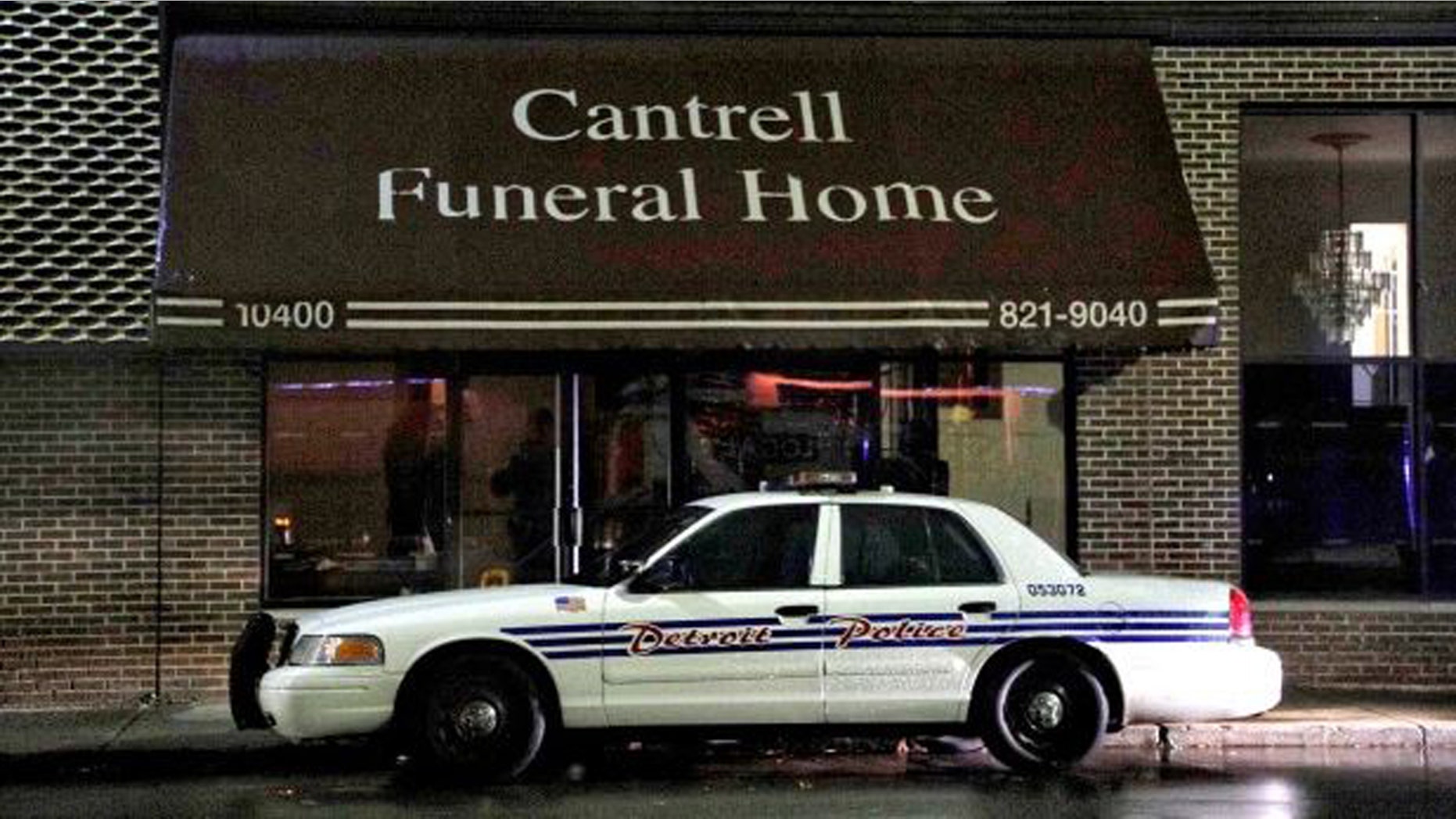 A Detroit Police vehicle is parked outside the Cantrell Funeral Home in Detroit on Friday, Oct. 12, 2018.