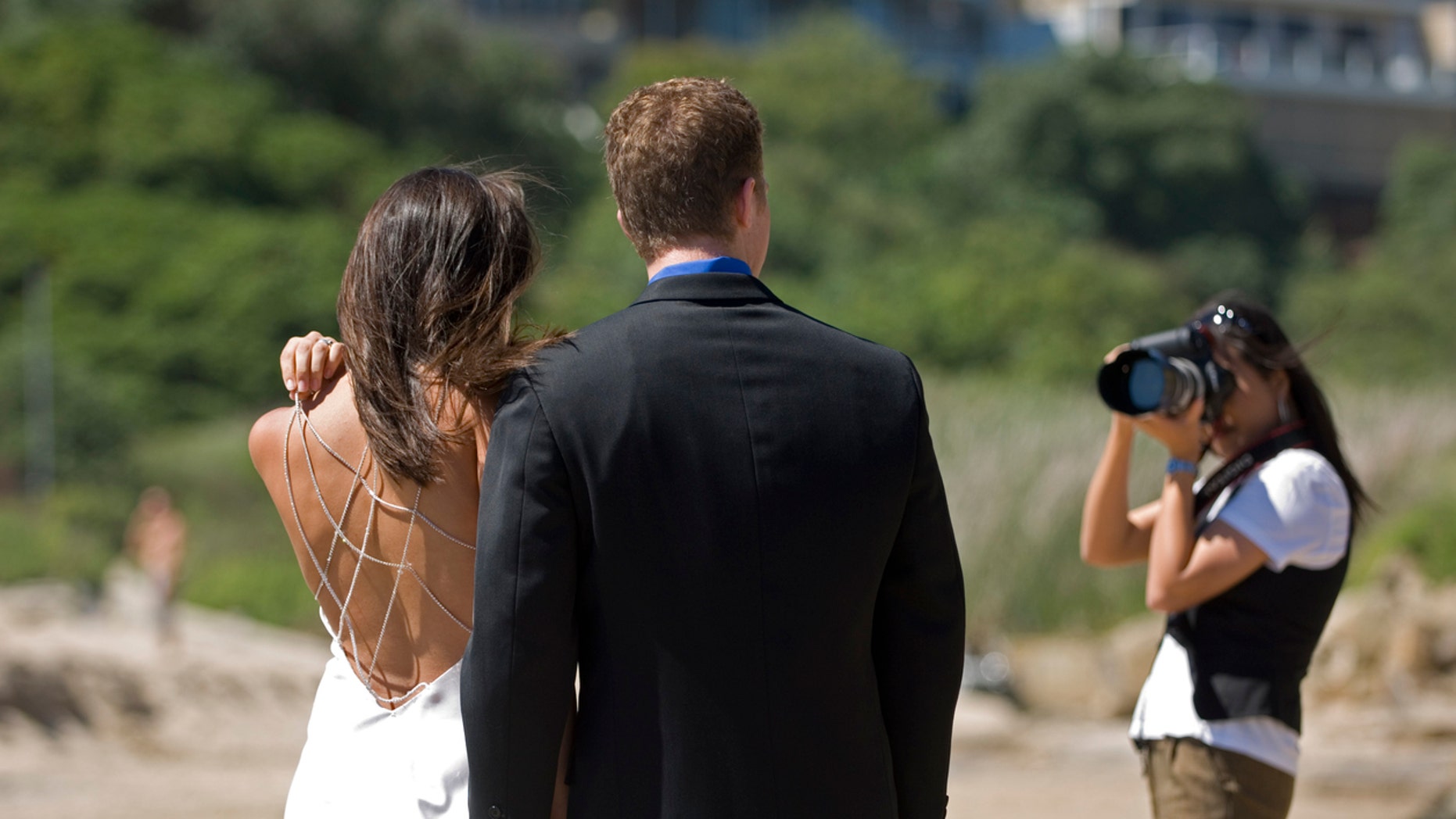 Wedding Photographer Praised After Video Of Her Pushing Stepmother Out