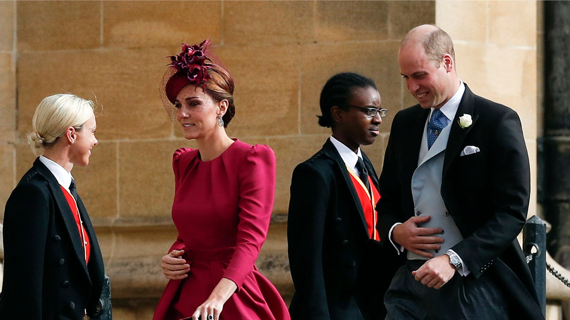 Britain's Prince William and Kate, Duchess of Cambridge arrive to attend the wedding of Princess Eugenie of York and Jack Brooksbank at St George’s Chapel, Windsor Castle, near London, England, Friday Oct. 12, 2018. (Adrian Dennis/Pool via AP)