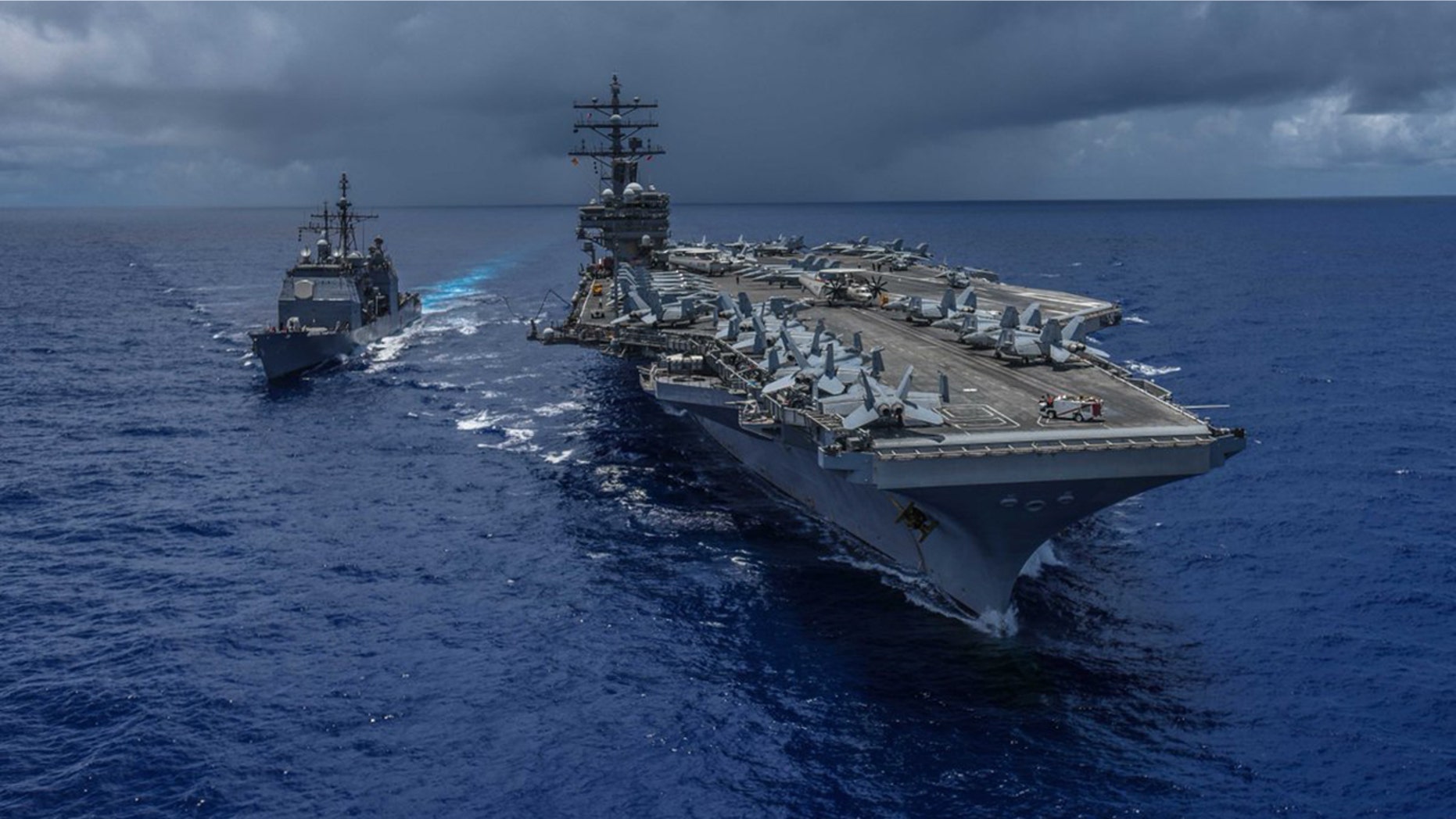 A U.S. Navy helicopter crashed on the flight deck of the USS Ronald Reagan in the Philippine Sea early Friday, injuring several sailors.