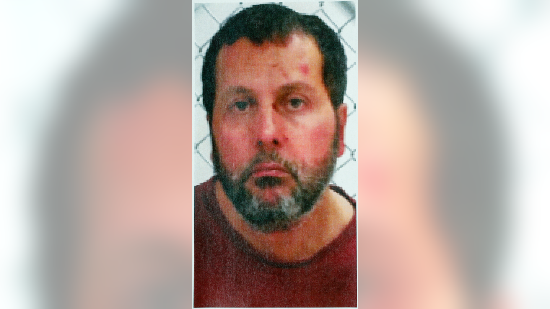 FILE - This undated file photo released by the FBI, shows Amor Ftouhi, of Canada. Ftouhi was indicted in the stabbing of a police officer on June 21, 2017, at an airport in Flint, Mich. A judge has ordered federal marshals to use a "minimum amount of force" if necessary to bring Ftouhi to court for a final hearing before he faces trial in the stabbing. He's due in court again Thursday, Oct. 25, 2018, to discuss the Nov. 5 trial. Ftouhi declined to leave his cell during a previous hearing in Flint federal court. (FBI via AP, File)