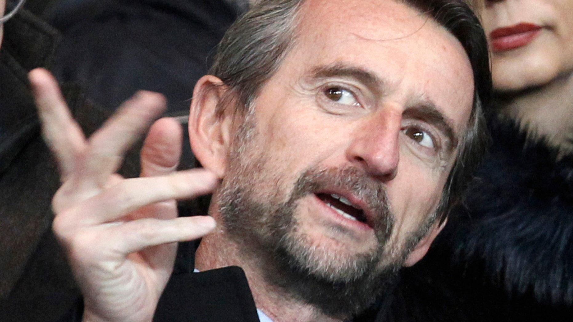 FILE - In this file photo dated Friday, Feb. 14, 2014, Paris Saint Germain's Jean-Claude Blanc, prior to the French League one soccer match between Paris Saint Germain and Valenciennes, at the Parc des Princes stadium, in Paris. PSG's deputy chief executive officer Jean-Claude Blanc spoke of his outrage Thursday Nov. 8, 2018, and pledged an investigation into some club scouts who secretly and illegally profiled potential young recruits from outside the Paris region with lists containing their ethnic origins.(AP Photo/Thibault Camus, FILE)