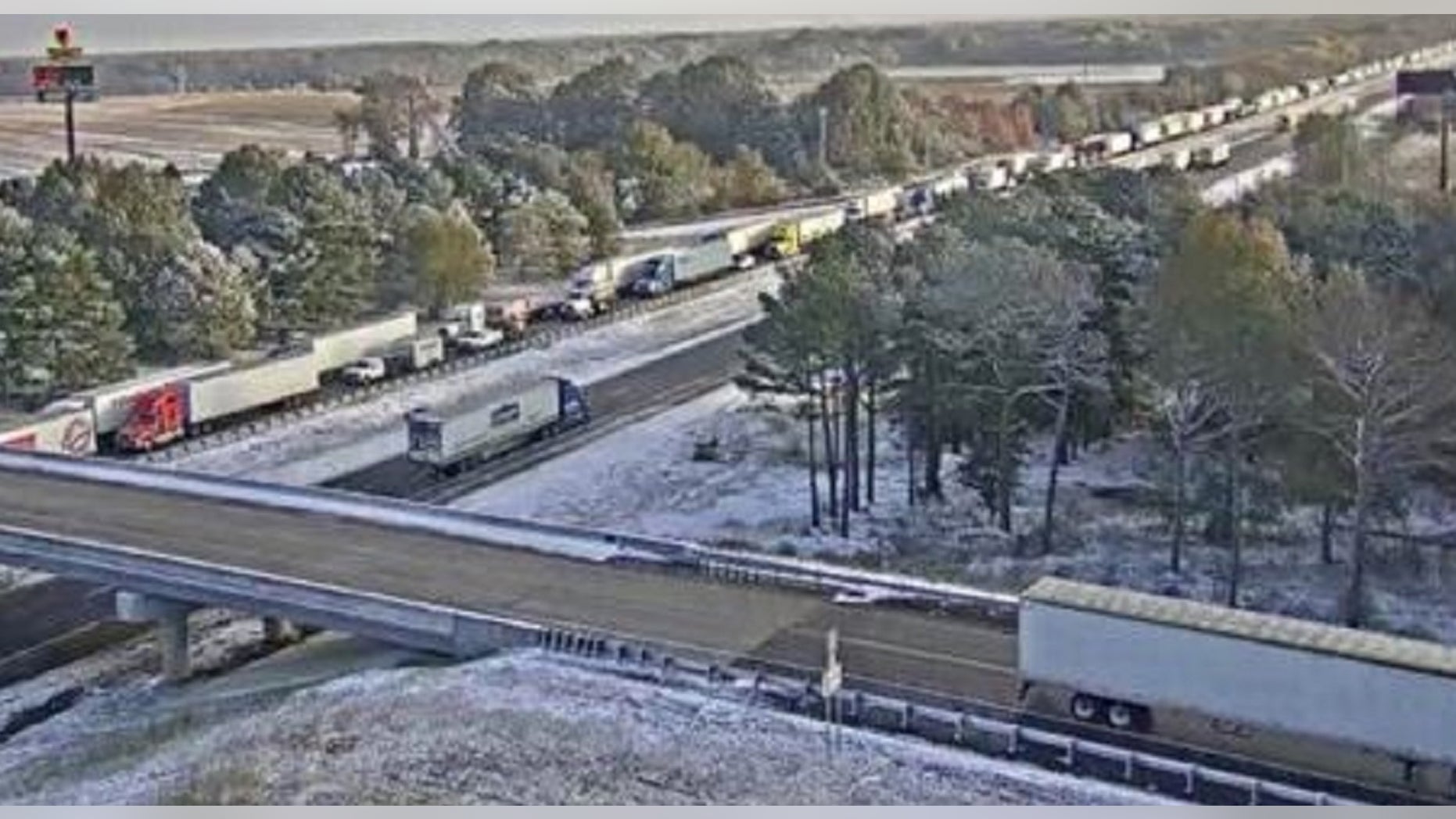 Traffic is shown stopped along Interstate 40 between the cities of Forrest City and Brinkley.