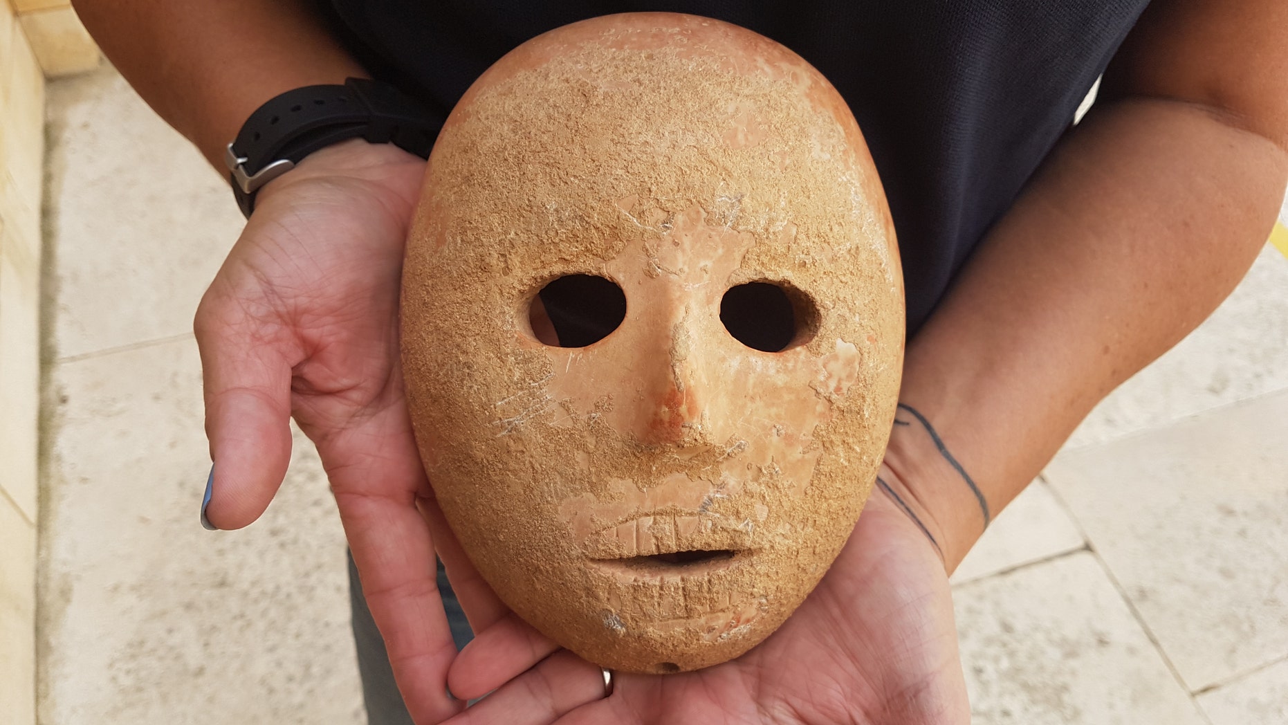 The ancient mask was discovered on the West Bank. (Antiquities Theft Prevention Unit, Israel Antiquities Authority)<br><br>