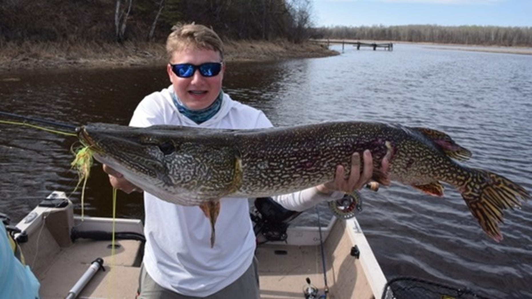 Matthew Swanson, of Woodbury, Minn., caught the northern pike on the Rainy River.