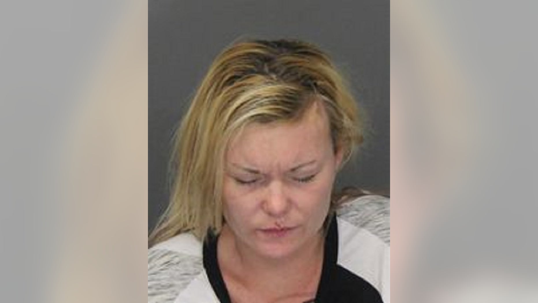 Sylvia Hope Verellen, 33, was arrested Saturday, accused of drunkenly assaulting police. She also swallowed diamond earrings that belonged to her boyfriend's deceased mother, police said.