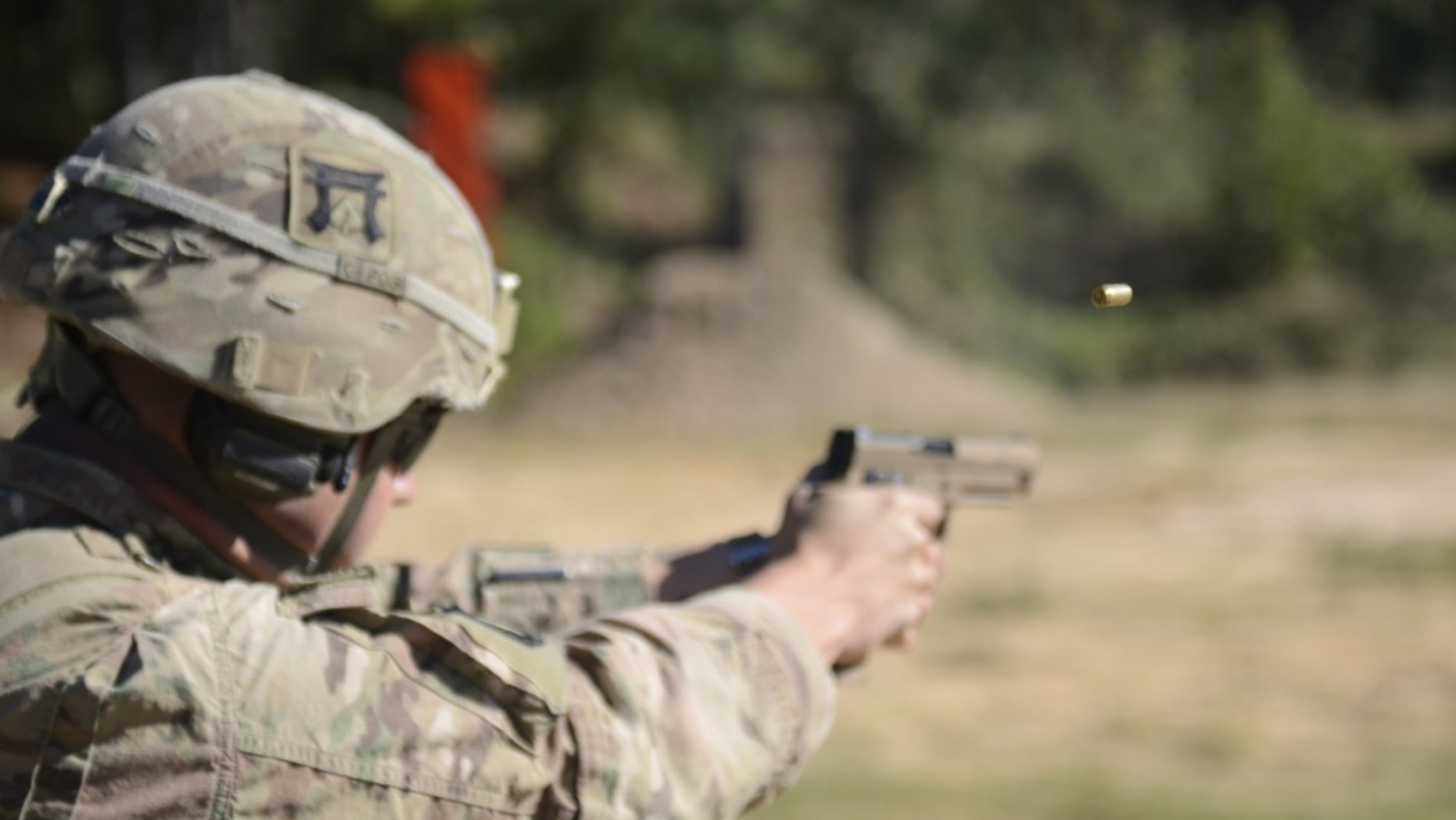 File photo - U.S. Army Cpl. Christopher Crisler, assigned to 101st Airborne Division, fires his M17 pistol at the 25m target in the U.S. Forces Command Small Arms Competition on Fort Bragg, North Carolina, Oct. 22, 2018.