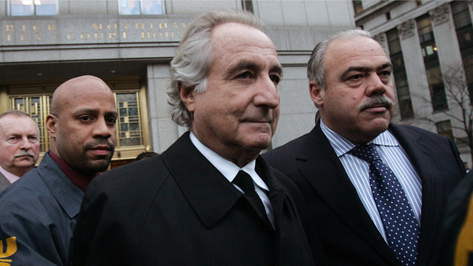 The Department of Justice on Thursday revealed that the Madoff Victim Fund (MVF) kicked off its third installment of issuing money, totaling to roughly $695 million, to people affected by the Bernie Madoff fraud scheme. Madoff (center) is seen walking out from Federal Court after a bail hearing in Manhattan in January 2009.