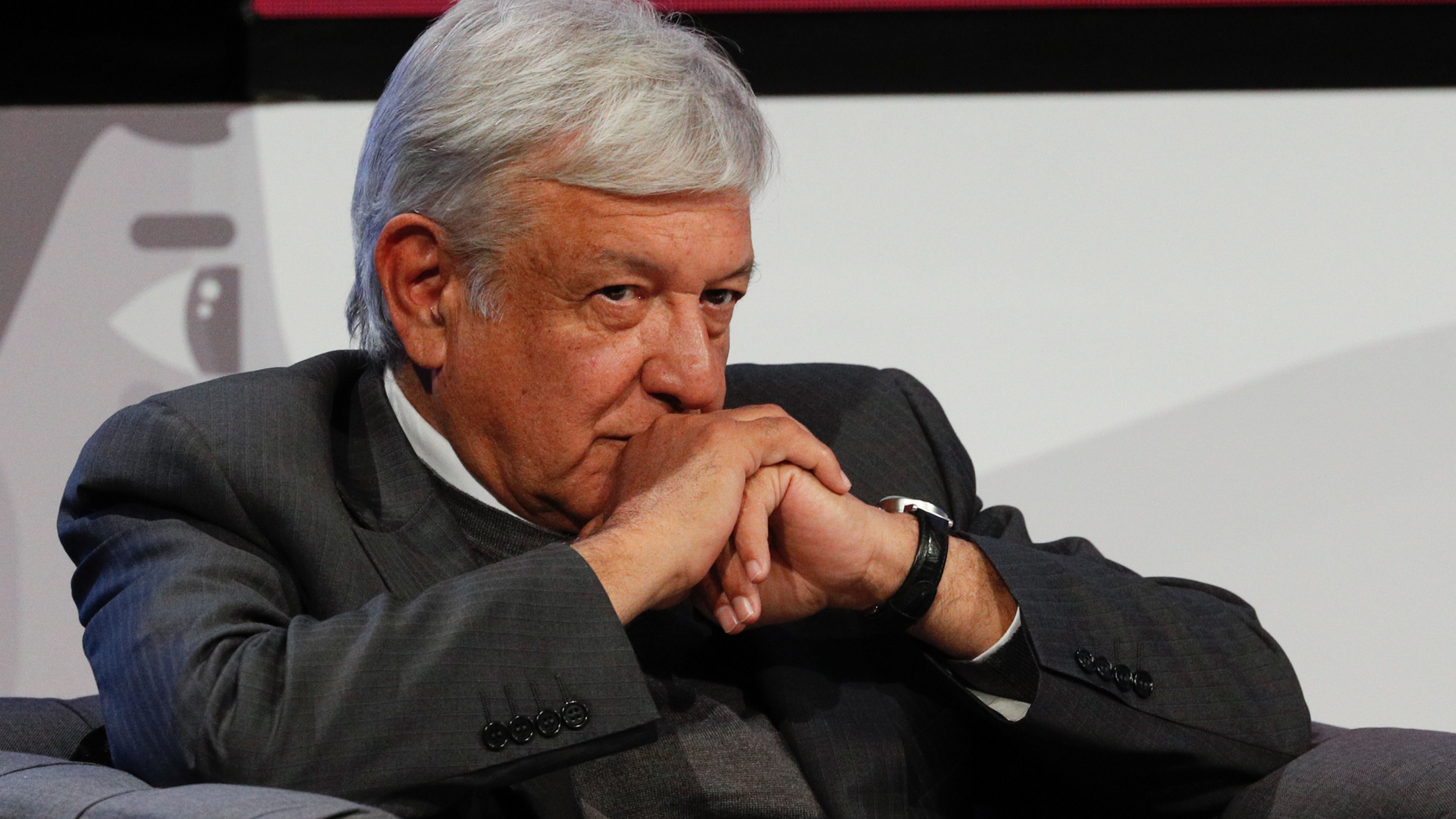 Mexican President-elect Andres Manuel Lopez Obrador listens during a meeting with Ricardo Salinas and other business leaders in Mexico City, Thursday, Nov. 22, 2018. The president-elect and Salinas signed an accord to offer internships within the Salinas Group for 12,000 young people and to create programs to assist tens of thousands of additional youth. (AP Photo/Rebecca Blackwell)