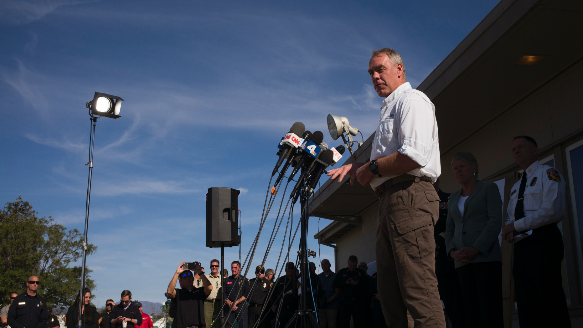 U.S. Secretary of the Interior Ryan Zinke speaks during a news conference at a command post as firefighters continue to battle the Woolsey Fire Thursday, Nov. 15, 2018, in Camarillo, Calif. (AP Photo/Jae C. Hong)