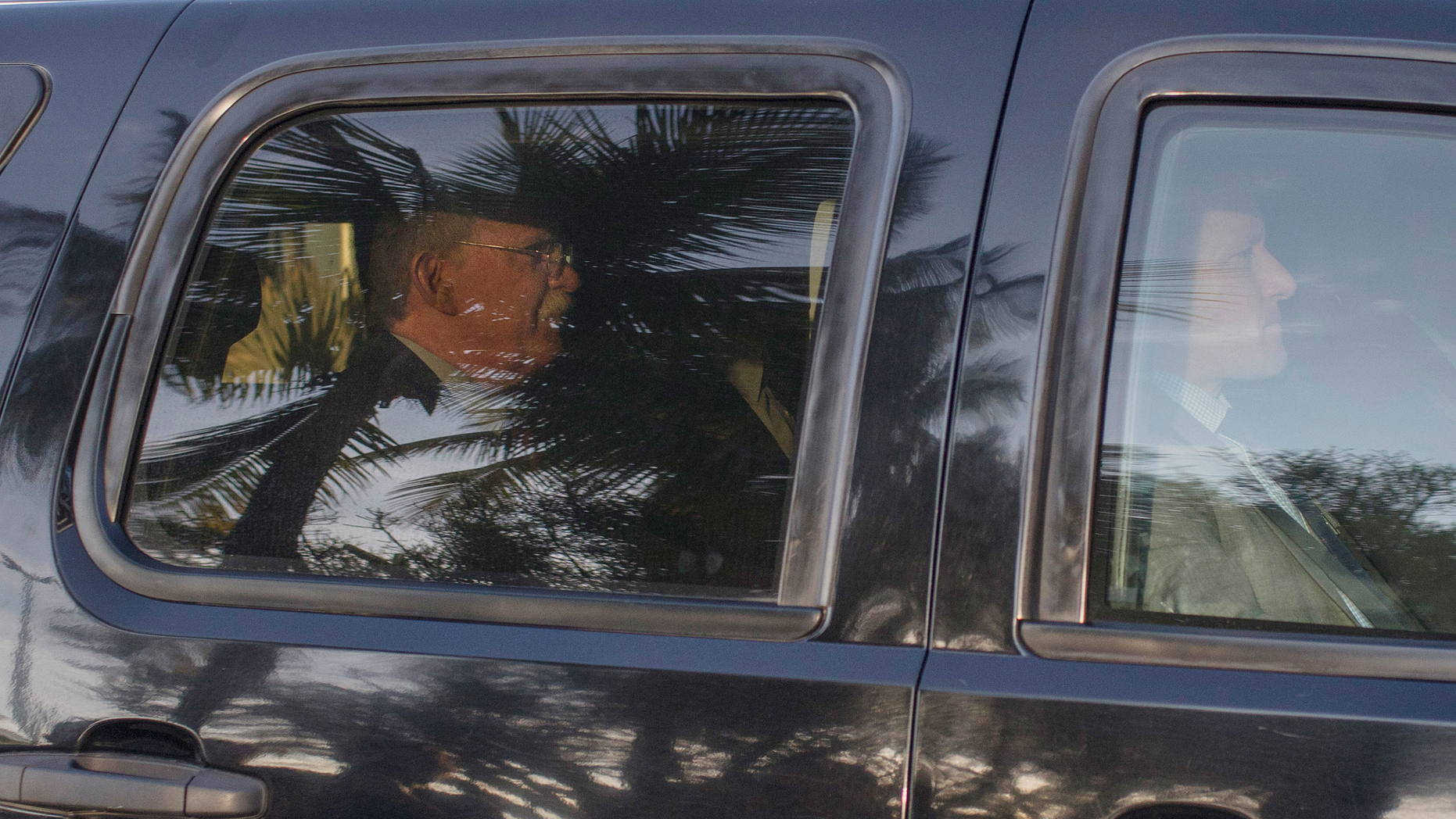 U.S. National Security Adviser John Bolton, in the car on left, arrives for a meeting with Brazil's President-elect Jair Bolsonaro in his residence in Rio de Janeiro, Brazil, Thursday, Nov. 29, 2018. Bolton will travel to Buenos Aires for the two-day Group of 20 summit. (AP Photo/Leo Correa)