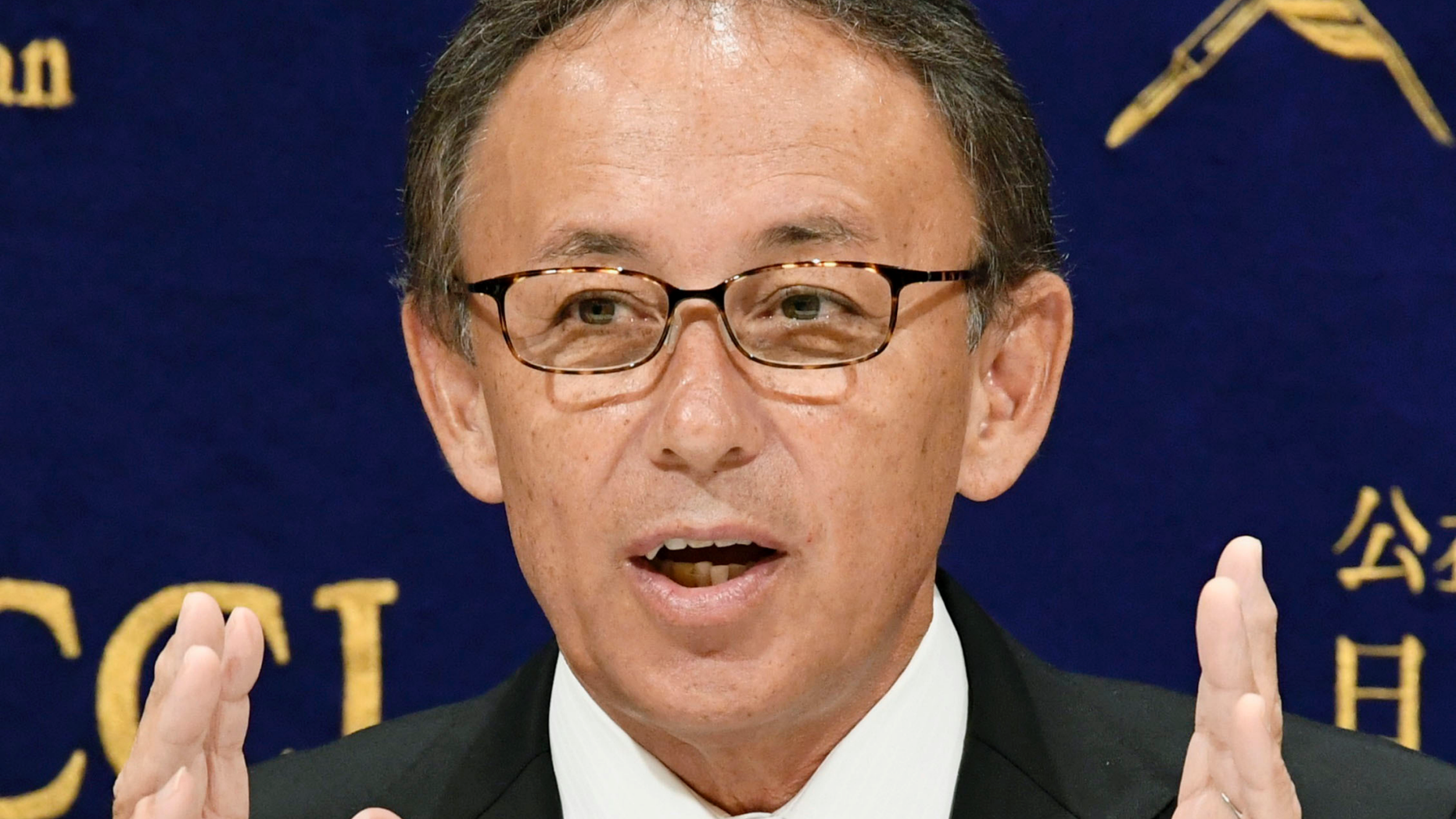 Okinawa Gov. Denny Tamaki speaks during a press conference at the Foreign Correspondents' Club of Japan (FCCJ) in Tokyo, Friday, Nov. 9, 2018. Gov. Tamaki talked to the media ahead of his U.S. trip to raise awareness among Americans about the tiny southern island's burden of hosting most of American troops (Sadayuki Goto/Kyodo News via AP)