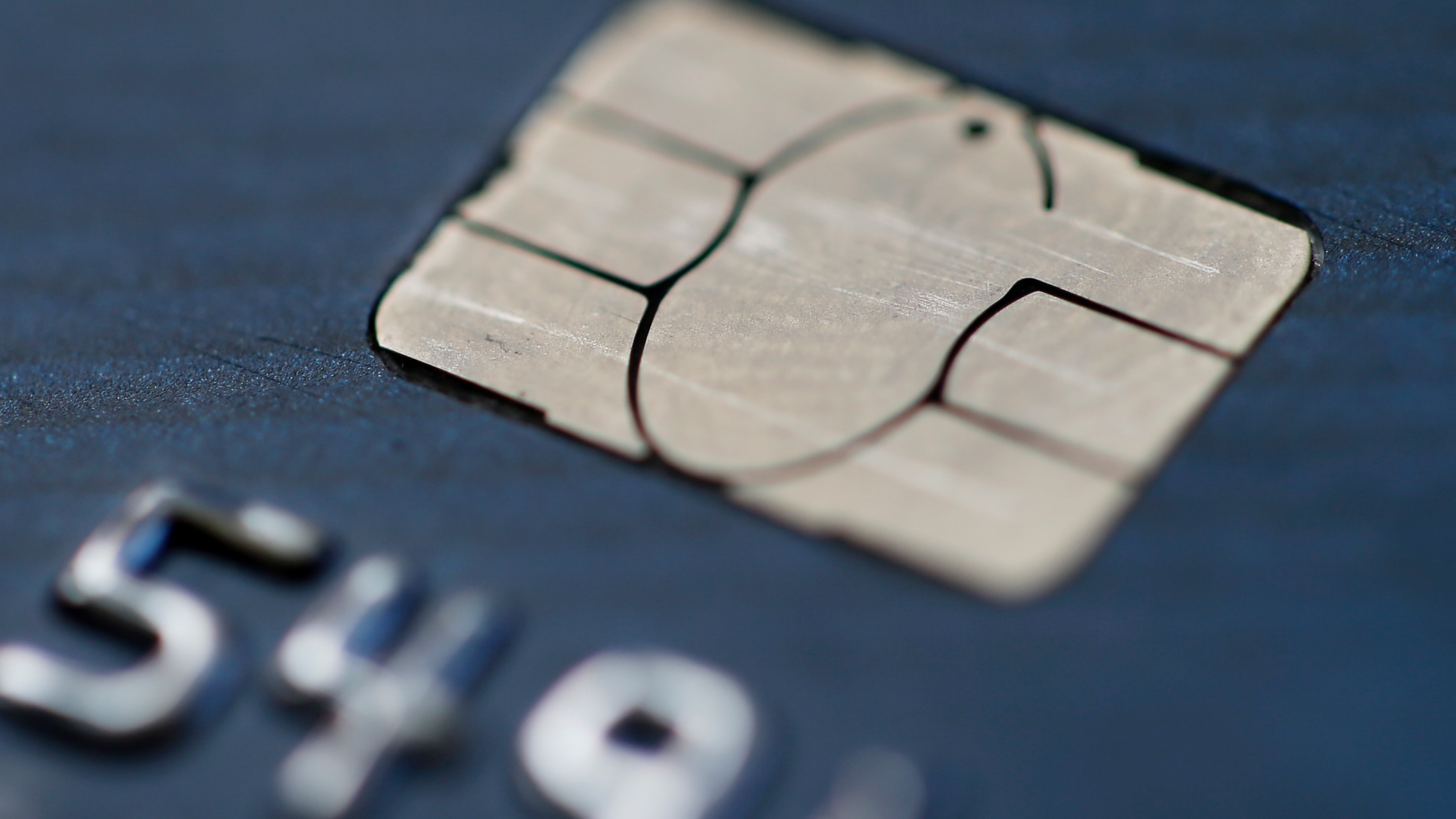 FILE- This June 10, 2015, file photo shows a chip credit card in Philadelphia. On Wednesday, Nov. 7, 2018, the Federal Reserve releases its September report on consumer borrowing. (AP Photo/Matt Rourke, File)