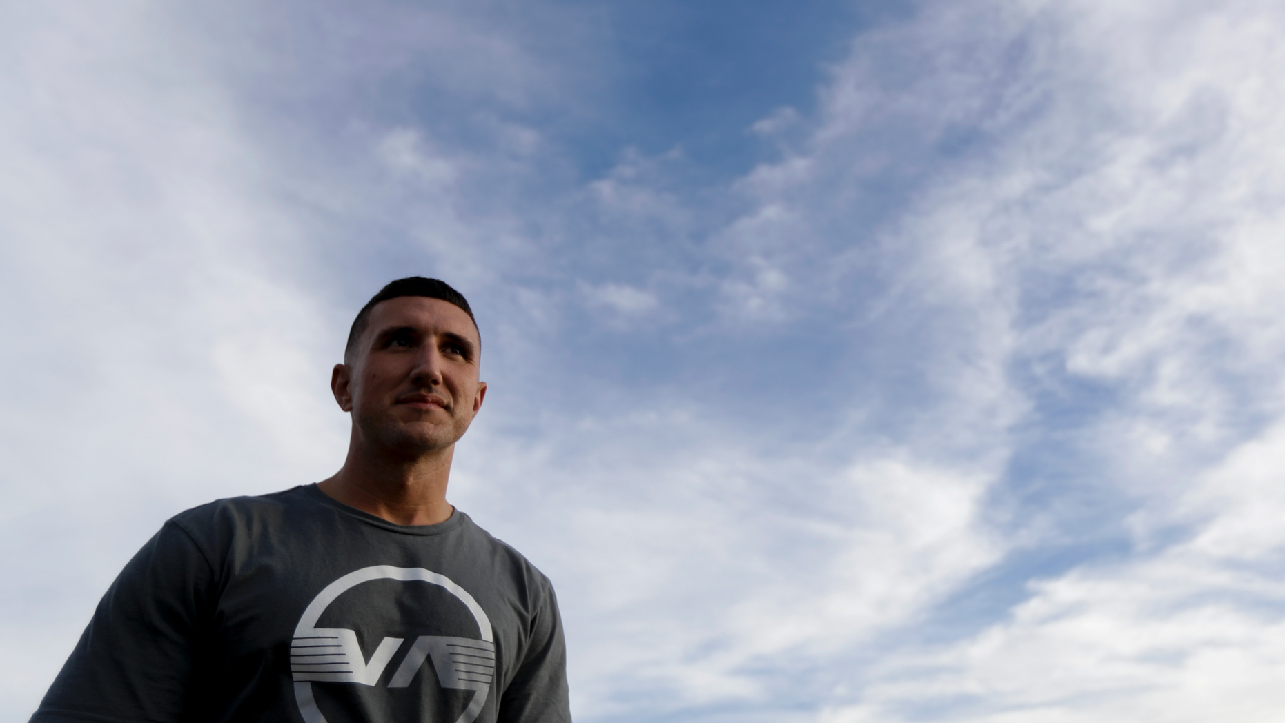 Marine veteran Shaun Tullar poses for a portrait, Thursday, Nov. 1, 2018, in San Diego. The number of homeless veterans across the U.S. declined more than 5 percent over the past year after a slight rise in 2017, the departments of Housing and Urban Development and Veterans Affairs announced Thursday. Tullar spent a time homeless, cycling in and out of jail on drug charges until finding help through a program behind bars that connected him with the VA. He now lives at Veterans Village of San Diego, is sober and working toward finishing a college degree. (AP Photo/Gregory Bull)