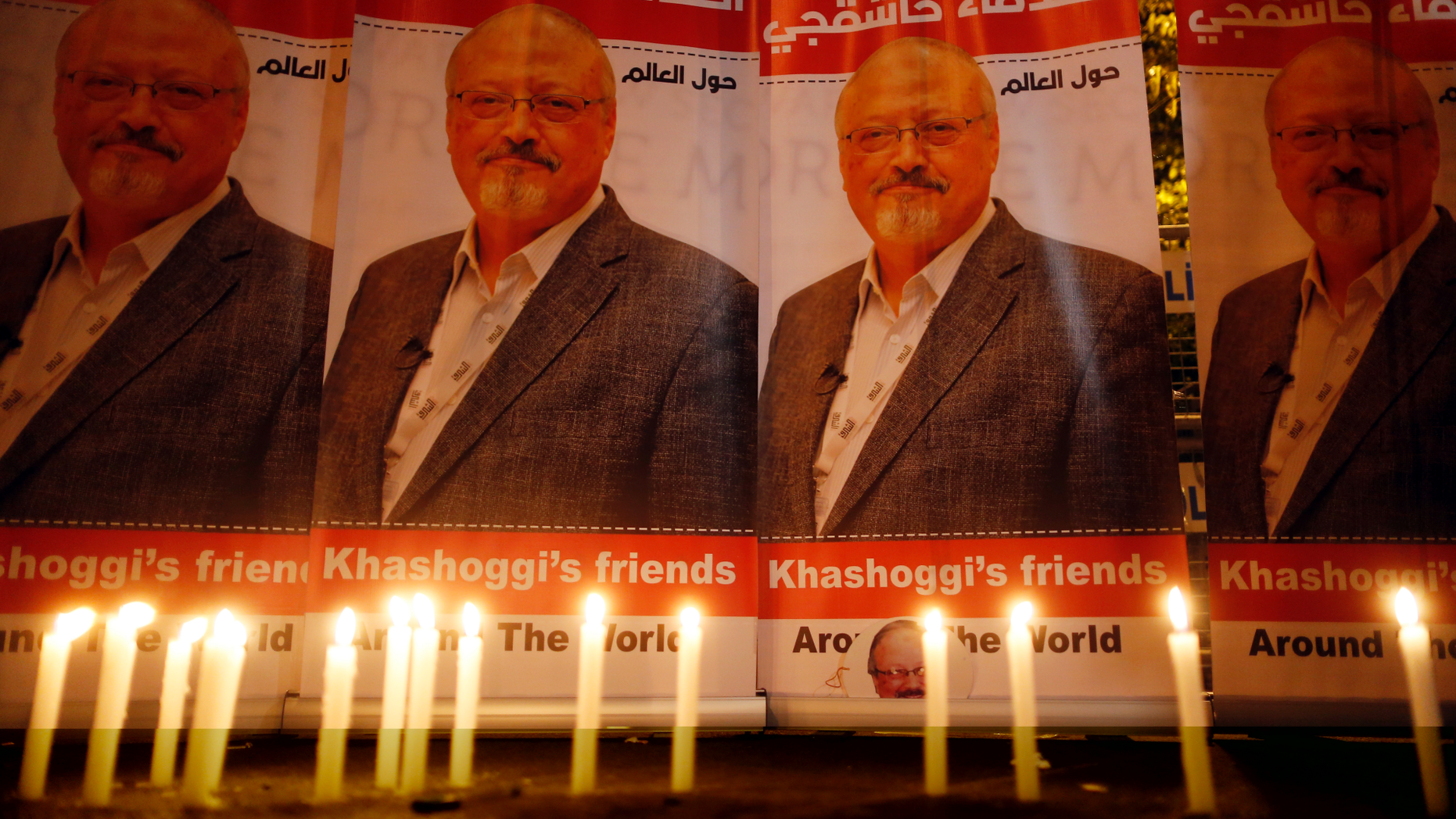 FILE - In this Oct. 25, 2018, file photo, candles, lit by activists, protesting the killing of Saudi journalist Jamal Khashoggi, are placed outside Saudi Arabia's consulate, in Istanbul, during a candlelight vigil. President Donald Trump is facing mounting pressure to sternly rebuke Saudi Arabia over the death of Khashoggi. So far, Trump is resisting calls to harshly reprimand the close U.S. ally. (AP Photo/Lefteris Pitarakis, File)
