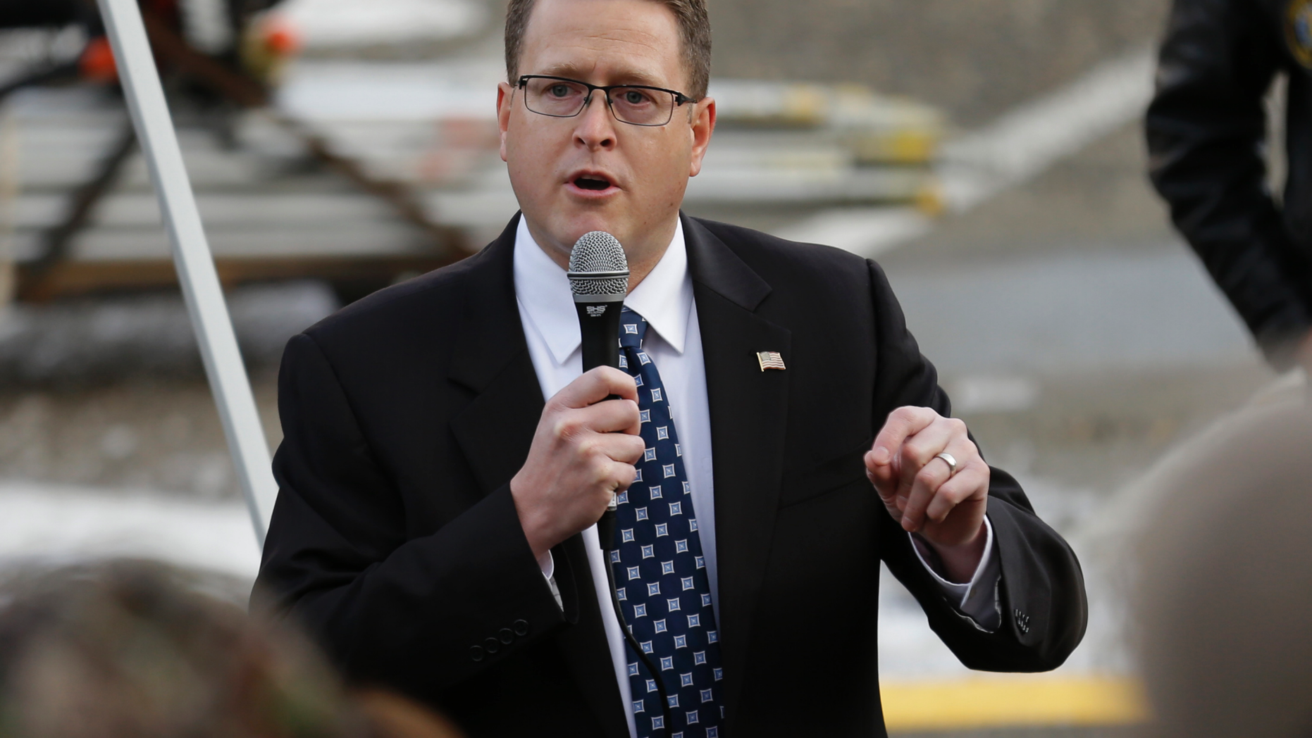FILE - In this Jan. 13, 2017 file photo Rep. Matt Shea, R-Spokane, speaks at a gun-rights rally, at the Capitol in Olympia, Wash.Shea, is facing intense criticism for distributing a document describing how a "Holy Army" should kill people who flout "biblical law," with some campaign donors asking for their contributions back. (AP Photo/Ted S. Warren,File)