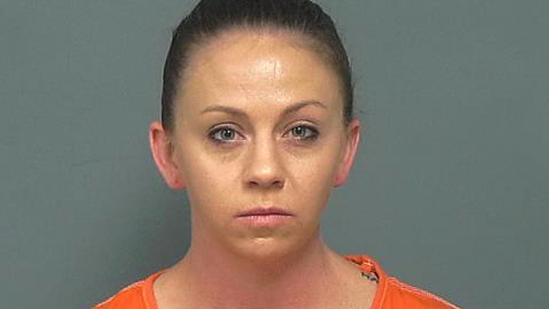 This photo provided by the Mesquite Police Department shows Amber Guyger, taken Friday, Nov. 30, 2018. Former Dallas police officer Guyger was indicted on murder charges Friday, nearly three months after she fatally shot an unarmed black neighbor whose apartment she said she entered by mistake, believing it to be her own. (Mesquite Police Department via AP)