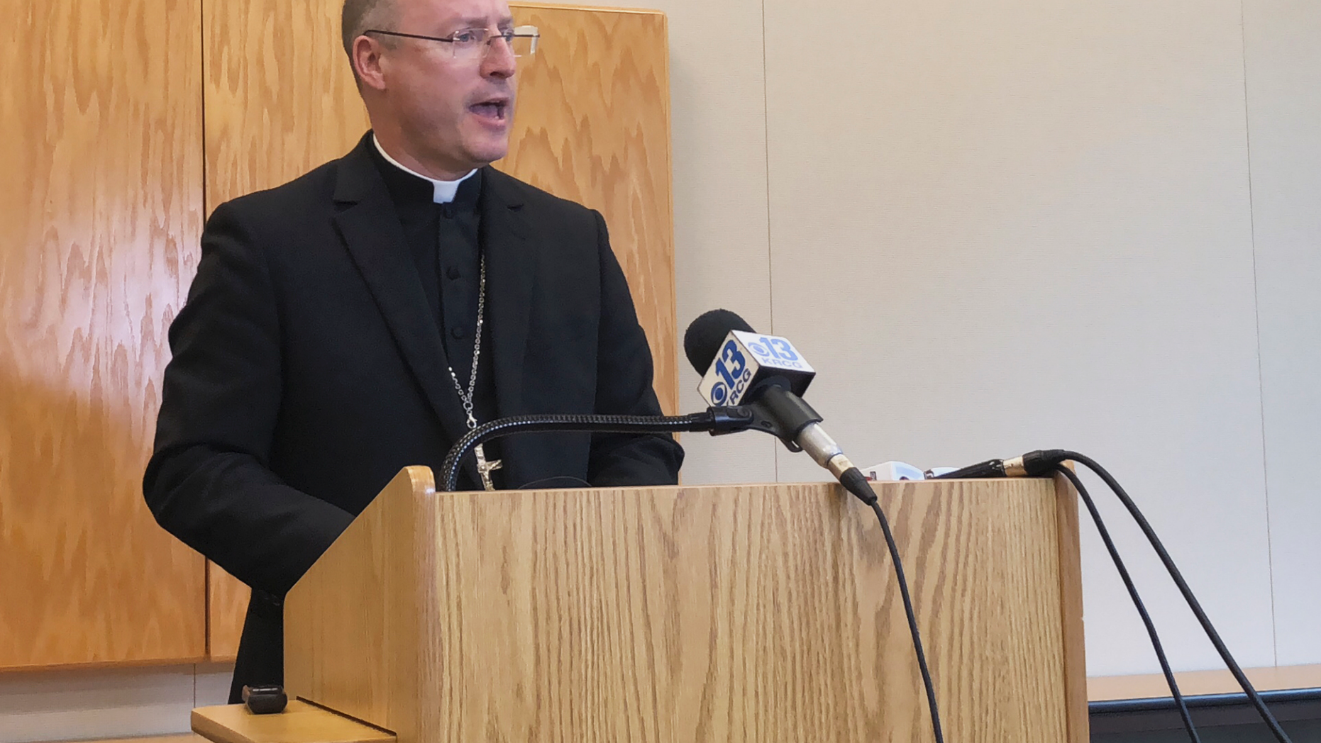 Bishop W. Shawn McKnight, of the Roman Catholic Diocese of Jefferson City, Mo., speaks at a news conference Thursday, Nov. 8, 2018. McKnight released a complete list of the names of 33 priests or religious brothers in the Jefferson City diocese have been "credibly accused" and/or removed from the ministry over sexual abuse of minor. This follows an internal investigation that began in February 2018. (AP Photo/Summer Ballentine)