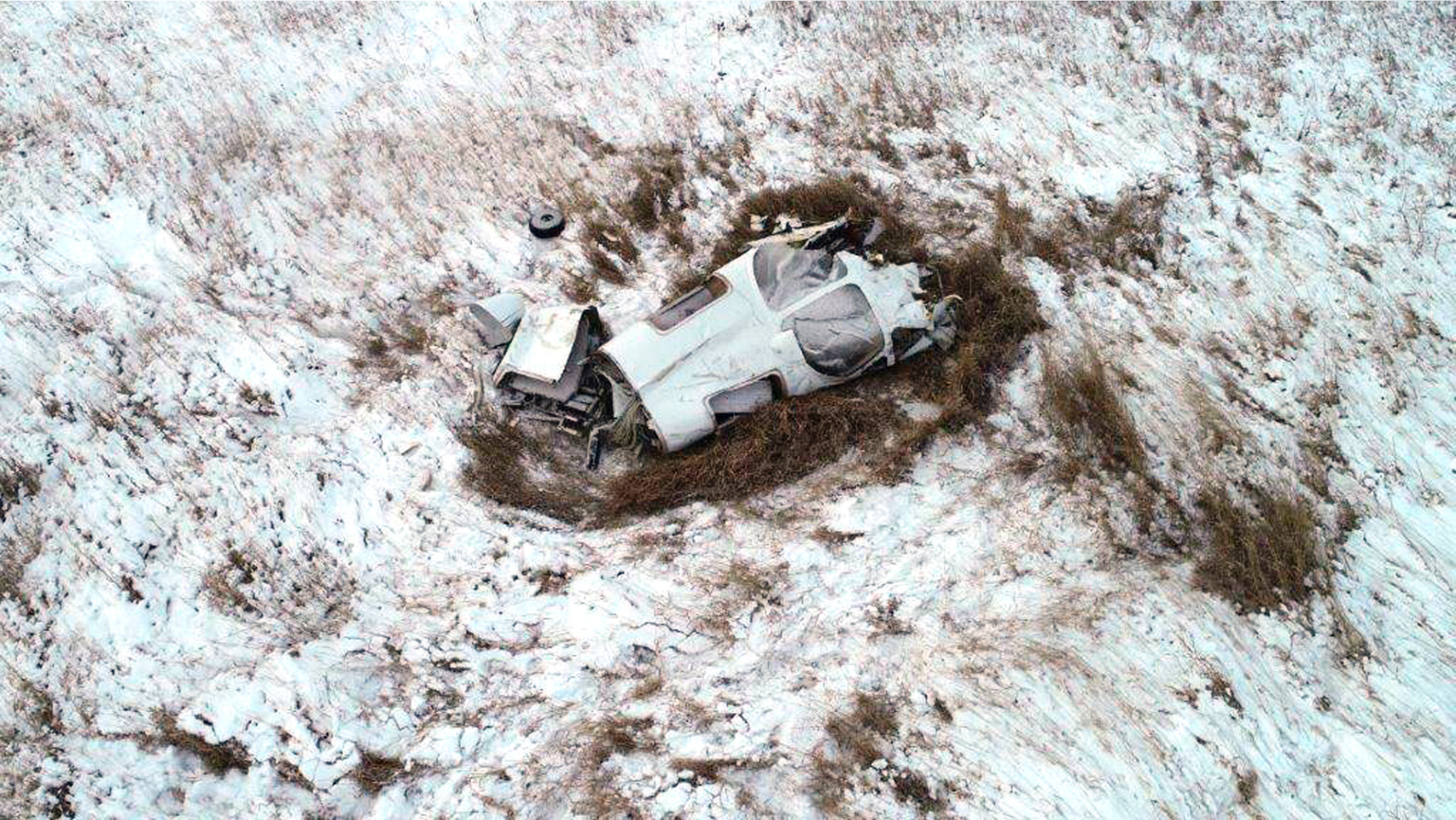 This Monday, Nov. 19, 2018, photo provided by the Morton County Sheriff's Office shows the wreckage of a twin-engine Bismarck Air Medical airplane that crashed late Sunday, Nov. 18 about 20 miles northwest of Bismarck, N.D., killing all three on board. (Morton County Sheriff's Office via AP)