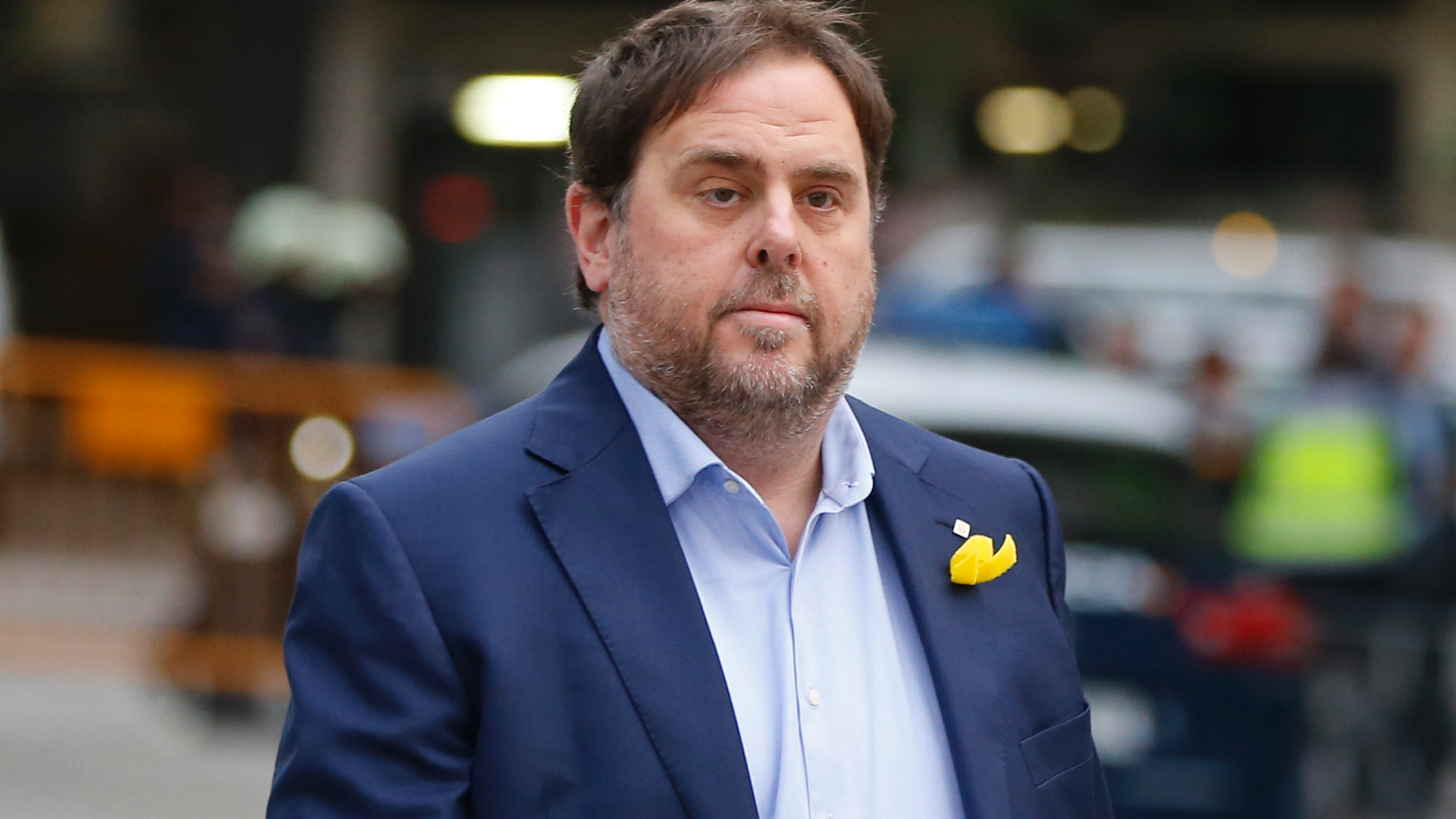 FILE - In this Nov. 2, 2017, file photo, the sacked Catalan Vice President Oriol Junqueras arrives at the National Court for questioning by a National Court judge investigating possible rebellion charges, in Madrid, Spain. Spanish prosecutors on Friday Nov. 2, 2018 are requesting for Junqueras to be imprisoned for 25 years on rebellion charges, the highest prison term in indictments issued for separatist leaders who pushed for Catalan independence last year. (AP Photo/Paul White, File)