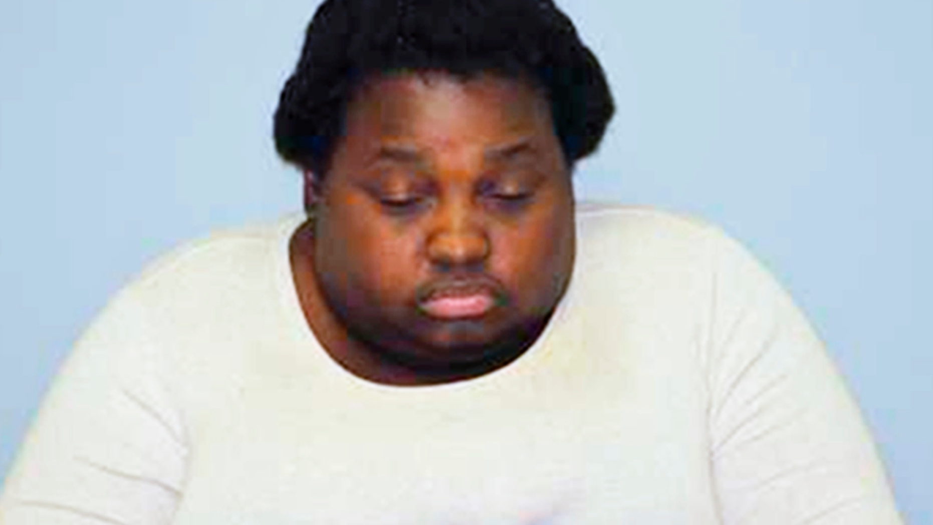 This photo provided by the Cole County Sheriff's Office in Missouri shows Quatavia Givens, who has been arrested and booked into jail on suspicion of first-degree child abuse in the death of 4-year-old Darnell Gray, whose body was found almost a week after she reported him missing. Givens reported Darnell missing from the apartment he shared with his father in a public housing complex in Jefferson City, Mo., on October 24. (Cole County Sheriff's Office via AP)