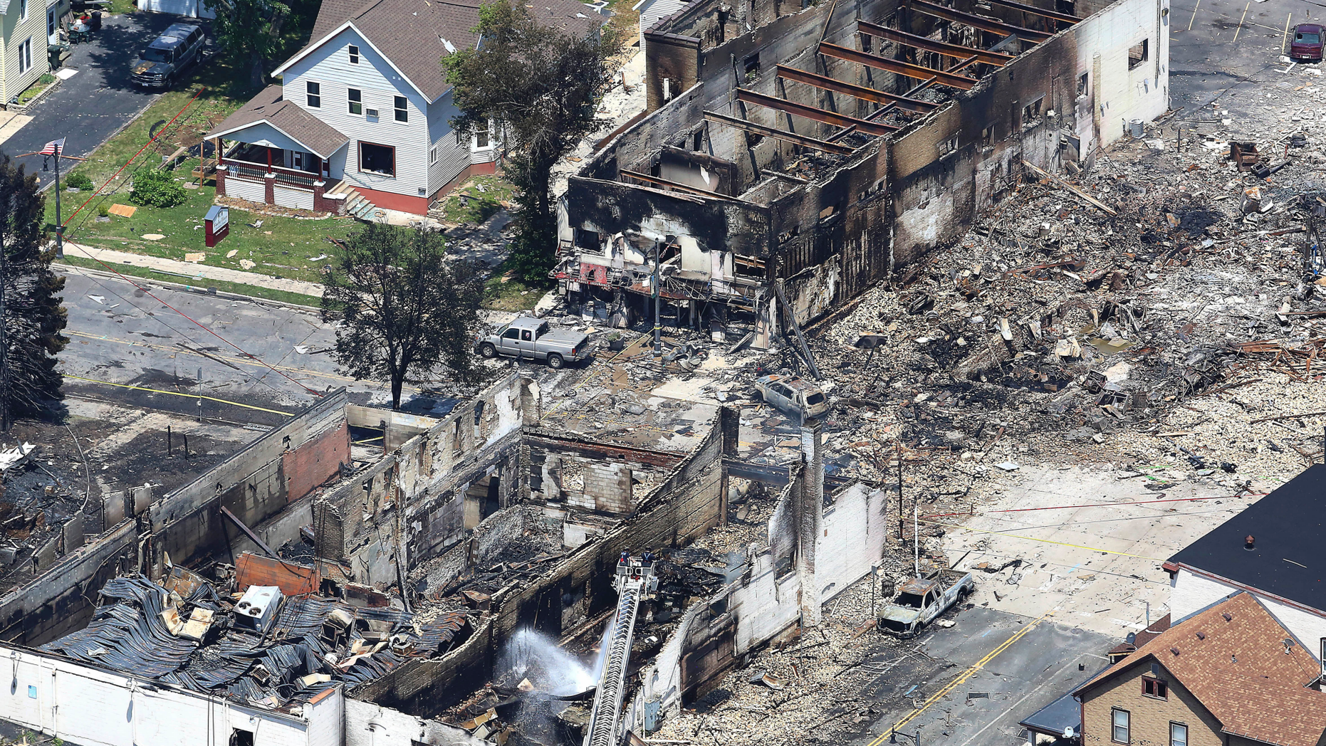 FILE - In this July 11, 2018, file photo, shows the aftermath of a gas explosion in downtown Sun Prairie, Wis. Court documents say a contractor failed to properly mark a natural gas line that was struck and caused the deadly explosion the day before. (John Hart/Wisconsin State Journal via AP, File)