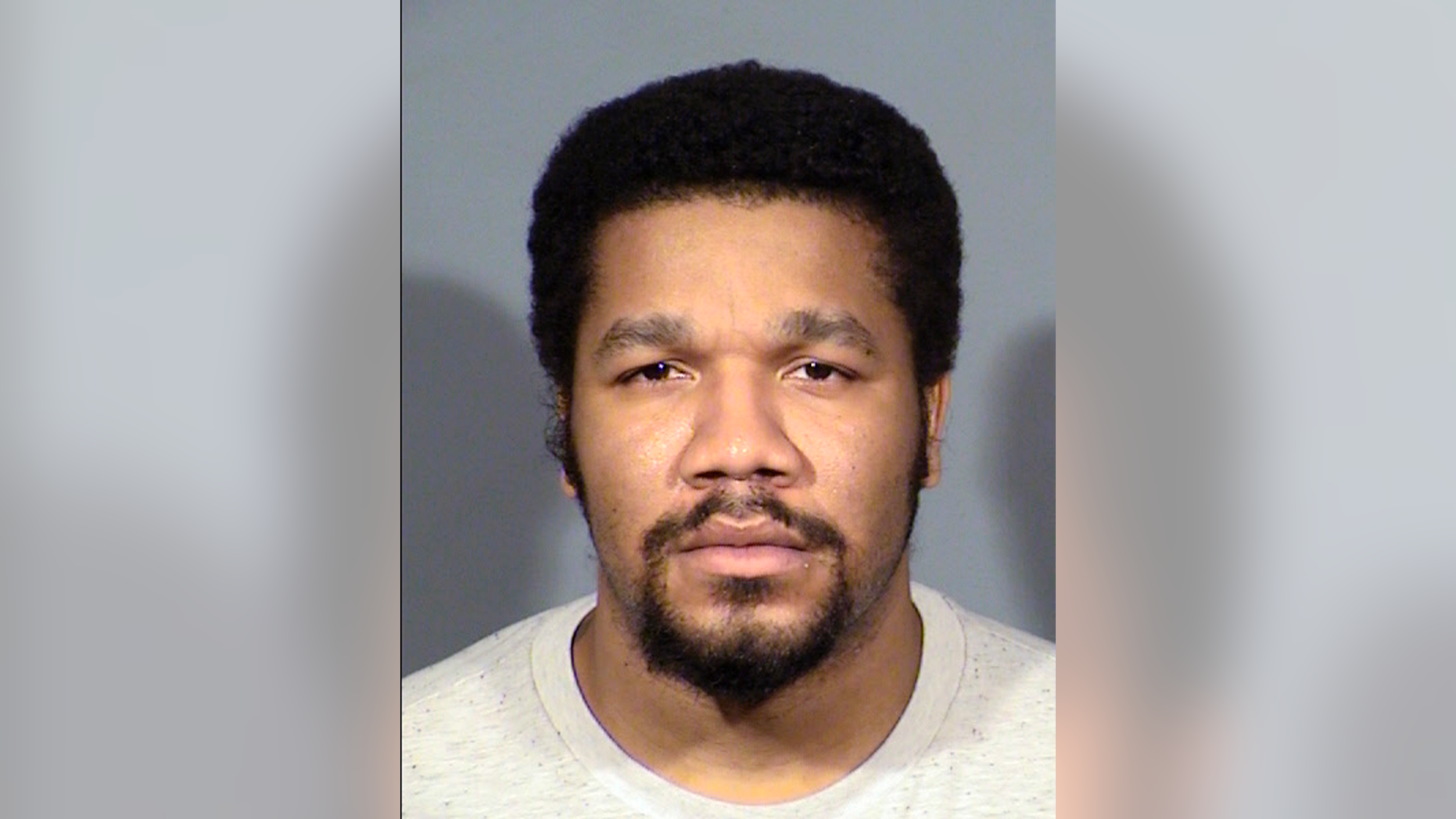FILE--This undated Clark County Detention Center file booking photo, provided by the Las Vegas Metropolitan Police Department, shows Julius Trotter, 31. Prosecutors will seek the death penalty in Nevada against a 31-year-old convicted felon accused of killing two Vietnamese tour leaders last June during a break-in robbery in in their room at a Las Vegas Strip hotel. A trial date was not immediately set, and Julius Trotter's attorneys didn't immediately respond to messages about the decision announced Thursday, Nov. 15, 2018, by prosecutor Michelle Fleck in Clark County District Court. (Las Vegas Metropolitan Police Department via AP, file)