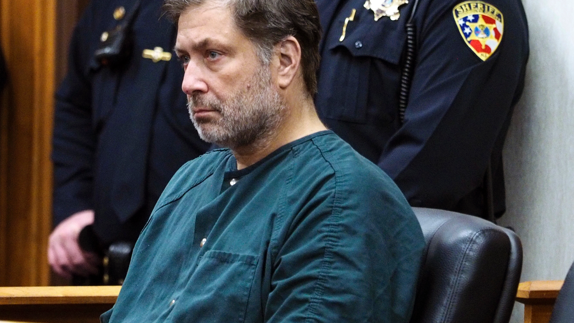 Paul Caneiro appears in Monmouth County Superior Court for a detention hearing on Friday, Nov. 30, 2018 in Freehold, N.J. Caneiro, 51, faces four counts of murder, along with arson and weapons charges, in the deaths of his brother Keith; Keith's wife, Jennifer; their 11-year-old son, Jesse; and their 8-year-old daughter, Sophia. (Patti Sapone/NJ Advance Media via AP, Pool)