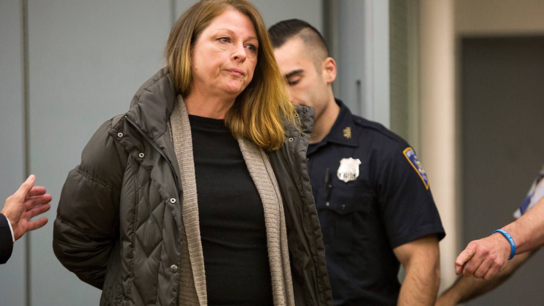 Annmarie Drago appears at Suffolk County District Court, Friday, Nov. 29, 2018 in Central Islip, N.Y. Drago, a 58-year-old nurse, has pleaded not guilty to the charge of criminally negligent homicide in the death of anti-gang activist Evelyn Rodriguez on September, 14, 2018 in Brentwood, N.Y. (Barry Sloan/Newsday via AP, Pool)
