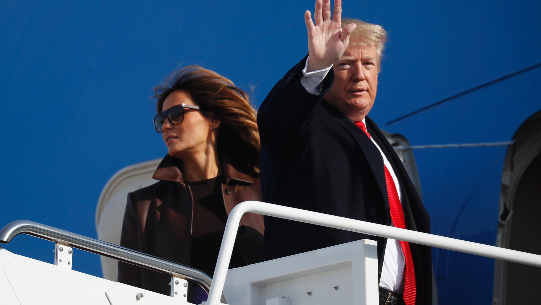 President Donald Trump and first lady Melania Trump board Air Force One, Thursday, Nov. 29, 2018 at Andrews Air Force Base, Md. Trump is traveling to Argentina to attend the G20 summit. (AP Photo/Pablo Martinez Monsivais)