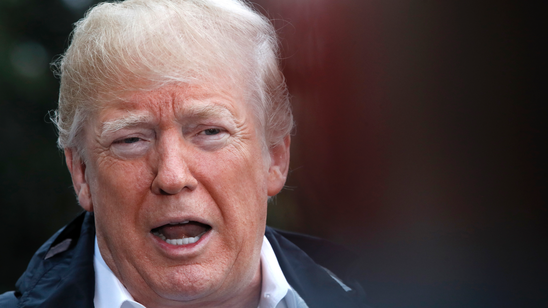 President Donald Trump answers questions from members of the media as he leaves the White House, Saturday Nov. 17, 2018, in Washington, en route to see fire damage in California. (AP Photo/Jacquelyn Martin)