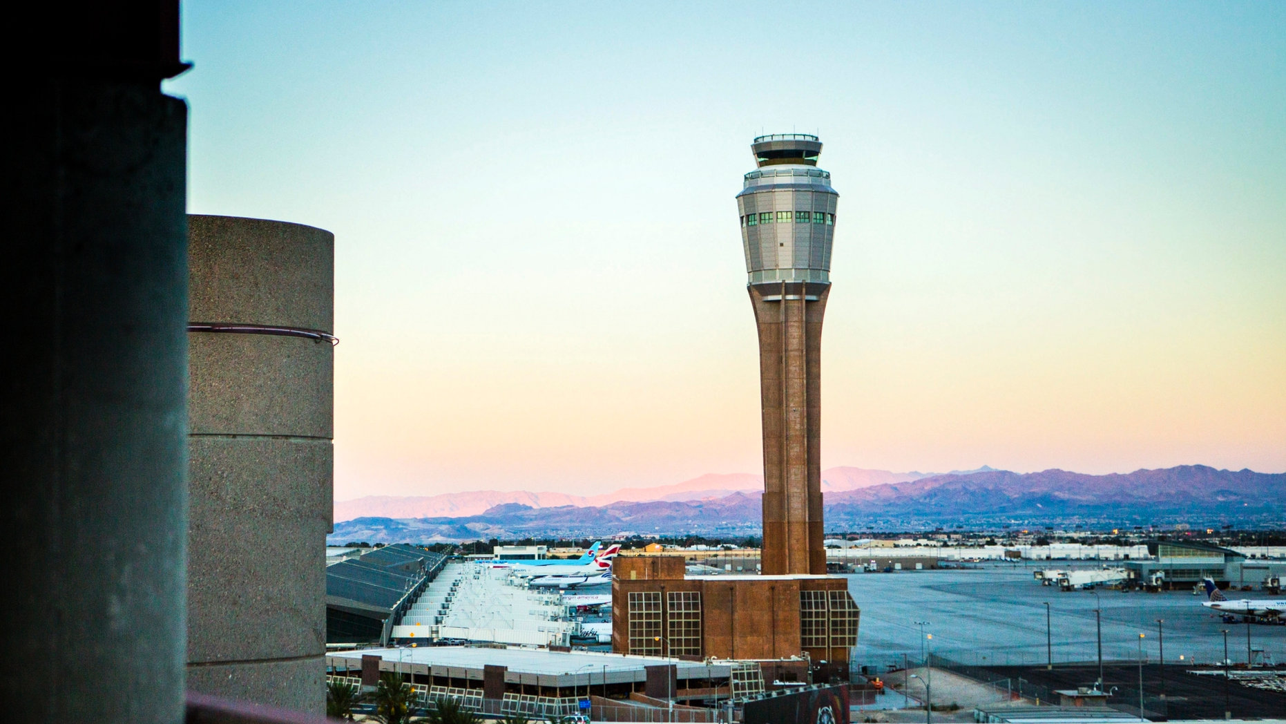 FILE - This Aug. 6, 2014 file photo shows the news FAA tower under construction at McCarran International Airport in Las Vegas. Federal and airport authorities said Friday, Nov. 9, 2018, they are investigating why an air traffic controller became incapacitated and went silent while working a night shift alone in the tower at busy McCarran International Airport in Las Vegas. "No safety events occurred during this incident," the Federal Aviation Administration said in a statement about what officials said amounted to a 40-minute span during which the female controller slurred words and then apparently lost consciousness shortly before midnight Wednesday. (Jeff Scheid/Las Vegas Review-Journal via AP, File)