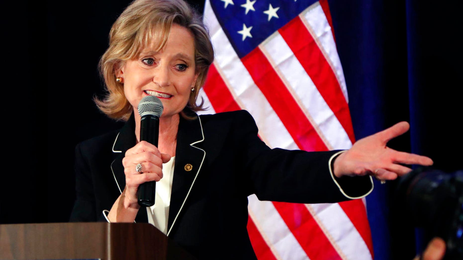 Republican U.S. Sen. Cindy Hyde-Smith celebrates her runoff win over Democrat Mike Espy in Jackson, Miss., Tuesday, Nov. 27, 2018. Hyde-Smith will now serve the final two years of retired Republican Sen. Thad Cochran's six year term. (AP Photo/Rogelio V. Solis)