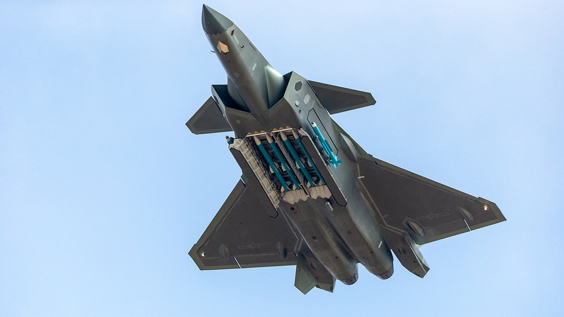 China's stealth fighter jets feature missiles during airshow show of