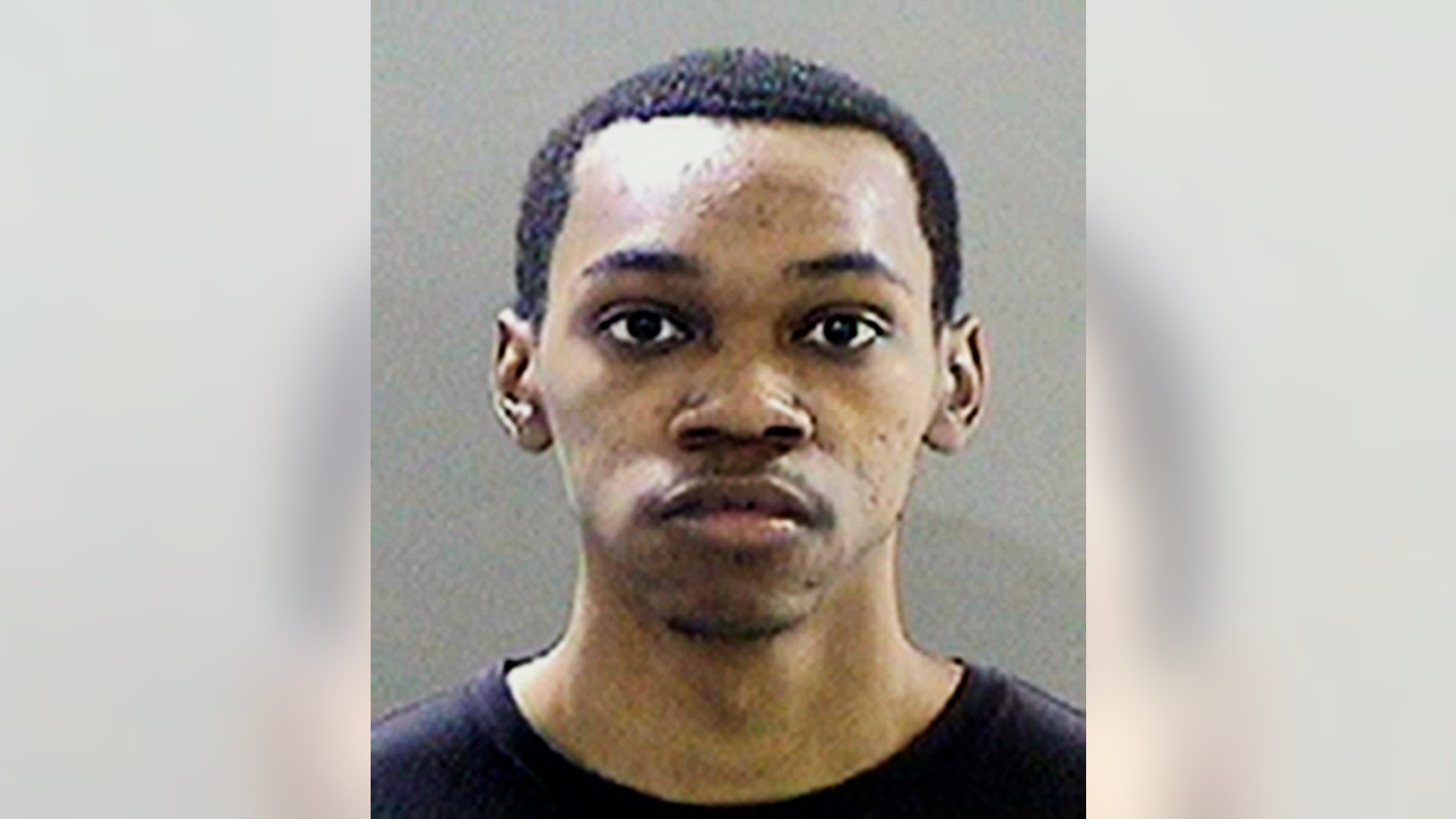 FILE - This file photo released by the Detroit Police Department shows Jaylon Kerley, who was fired from his job as a food vendor at the Detroit Tigers' baseball stadium after video surfaced showing him spitting on a pizza.