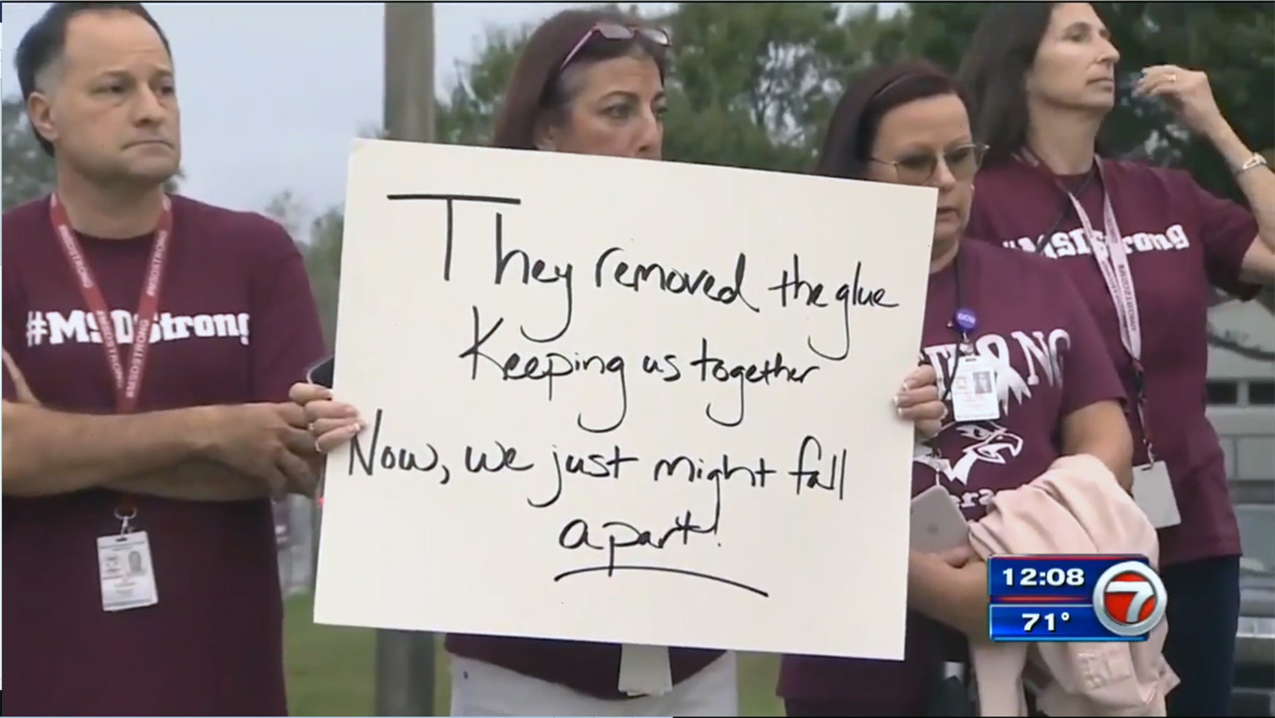 Teachers at Marjory Stoneman Douglas High School protest Tuesday against the reassignment of four directors.