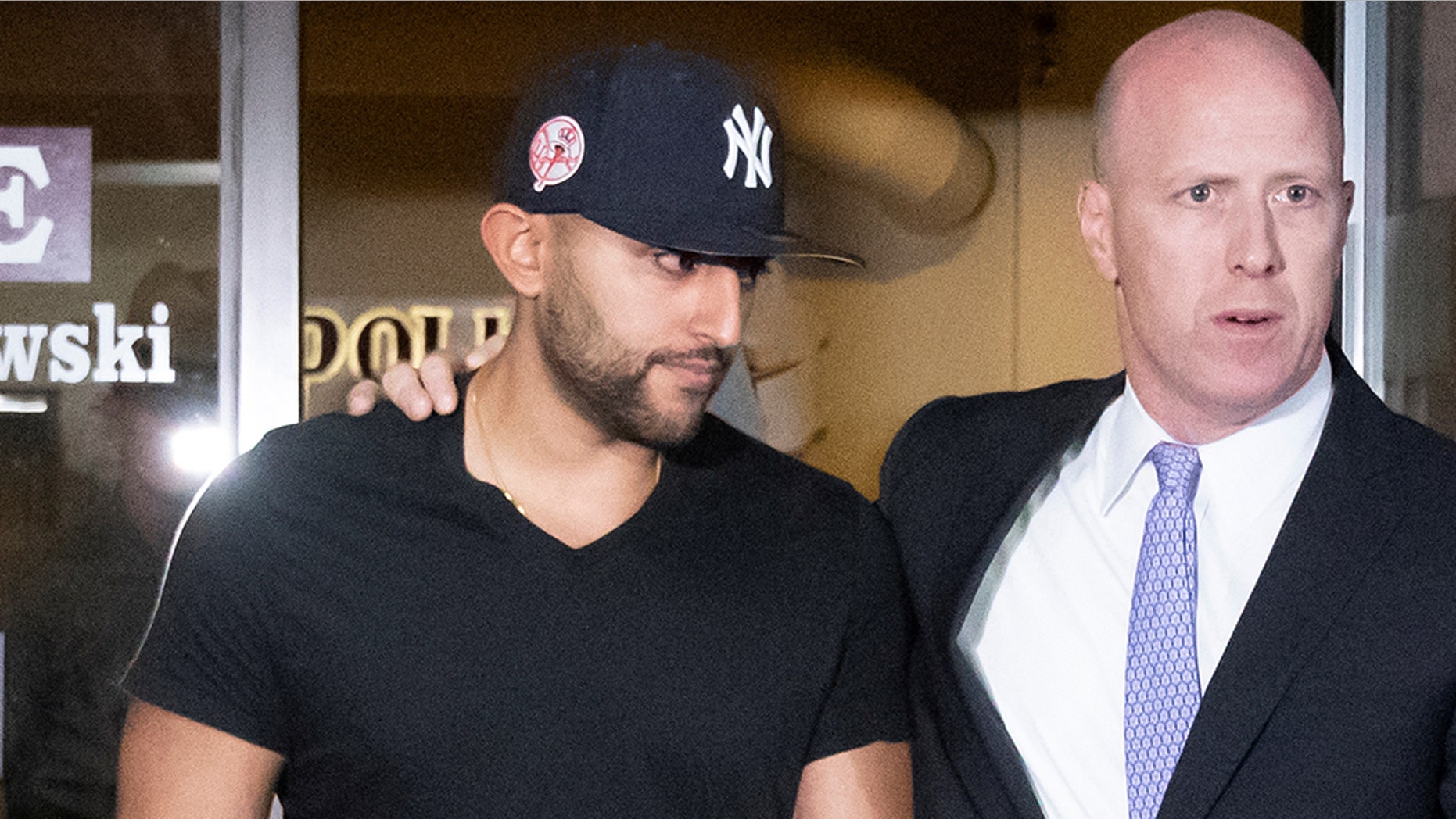 Nauman Hussain, left, operator of a limousine company that owned the vehicle involved in a crash that killed 20 people in upstate New York, leaves with his lawyer Lee Kindlon after posting bond at Cobleskill Town Court in Cobleskill, N.Y., Oct. 10, 2018. (Reuters)