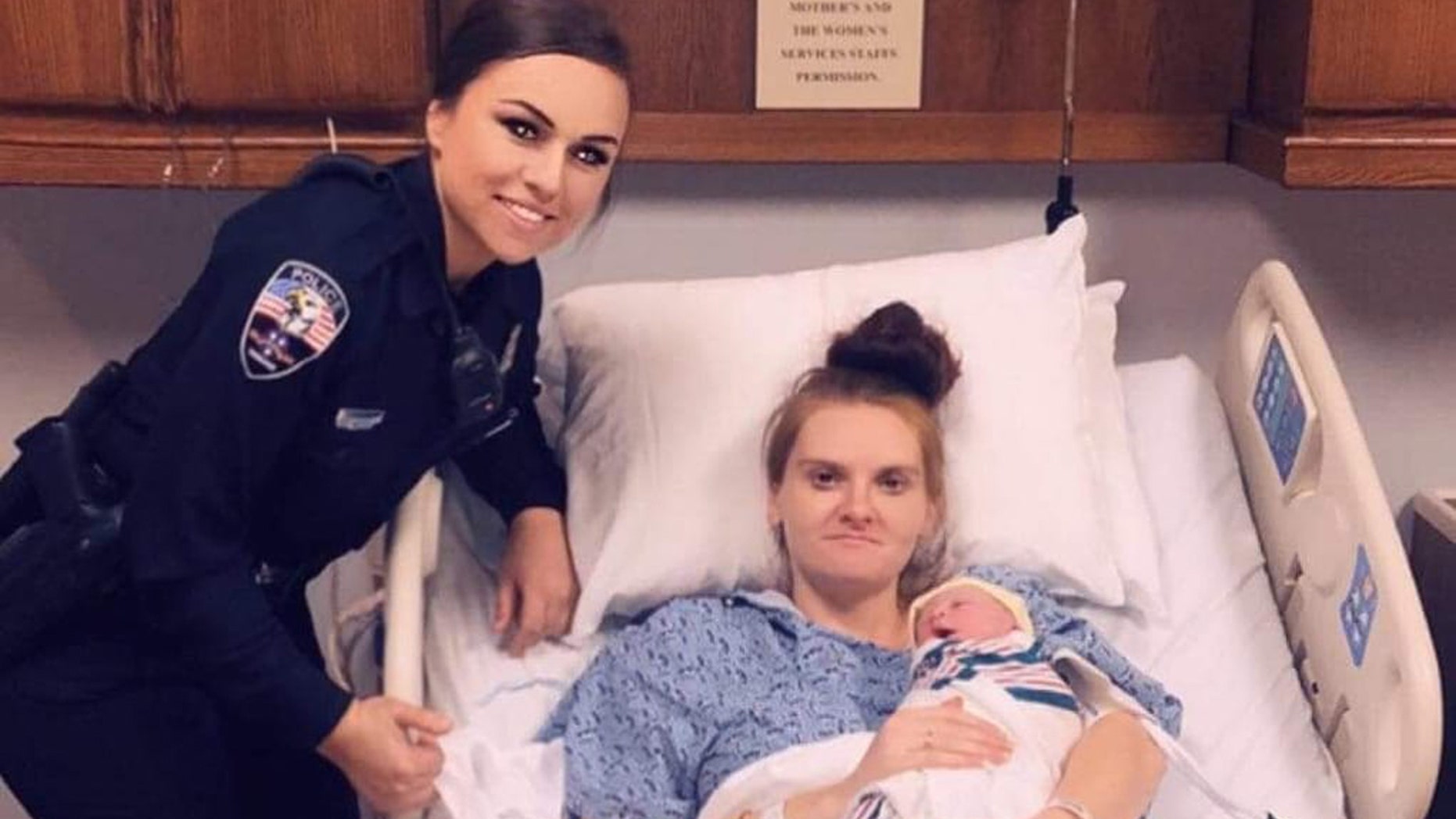 Dickson Police Officer Sierra Reprogal poses with Brigette Crumley and her newborn daughter, named after the officer who helped deliver her.
