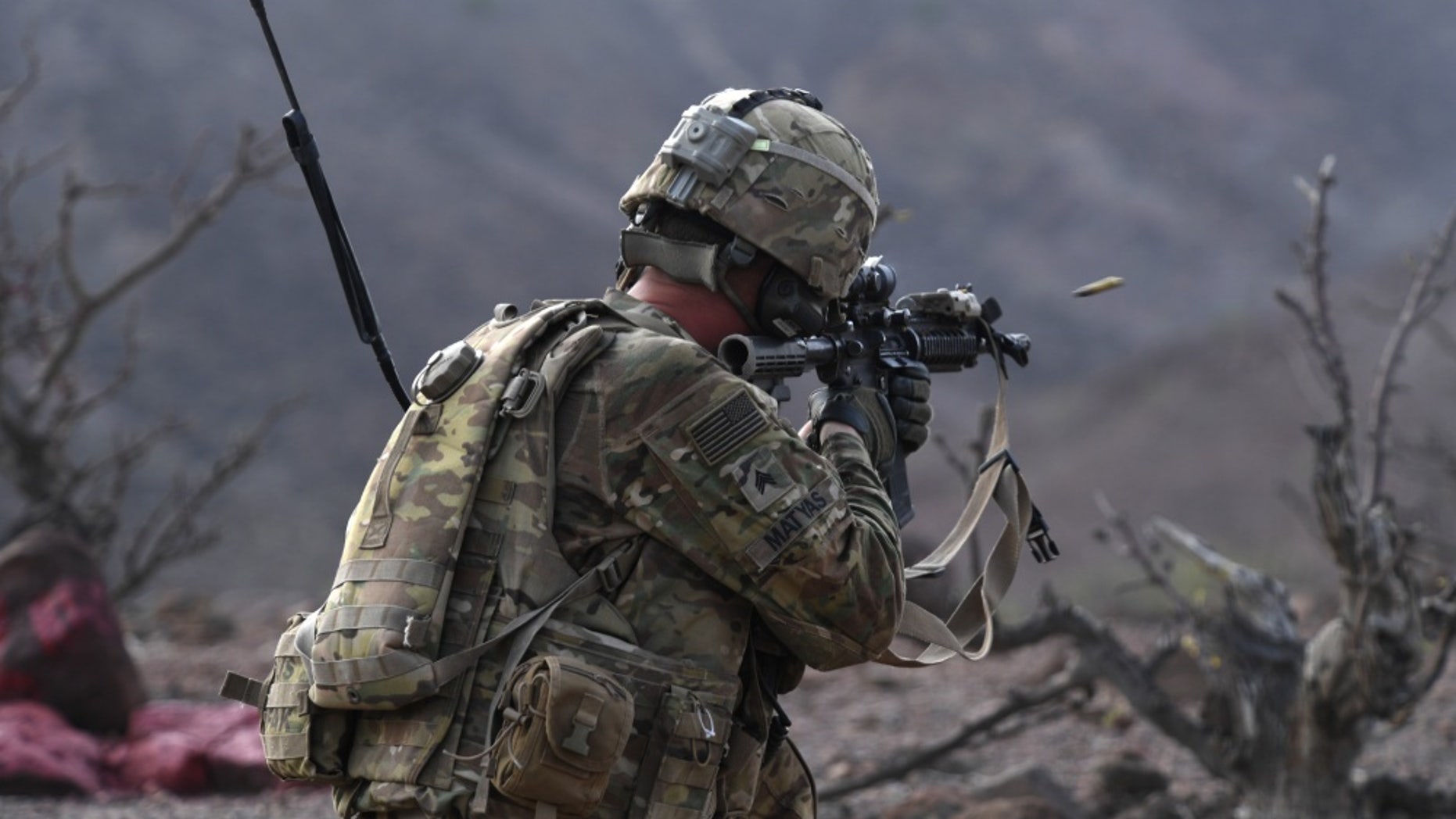 File photo - A 10th Mountain Division Soldier fires an M4 rifle during a platoon Situational Training Exercise at a range in Arta, Djibouti, Aug. 25, 2018.