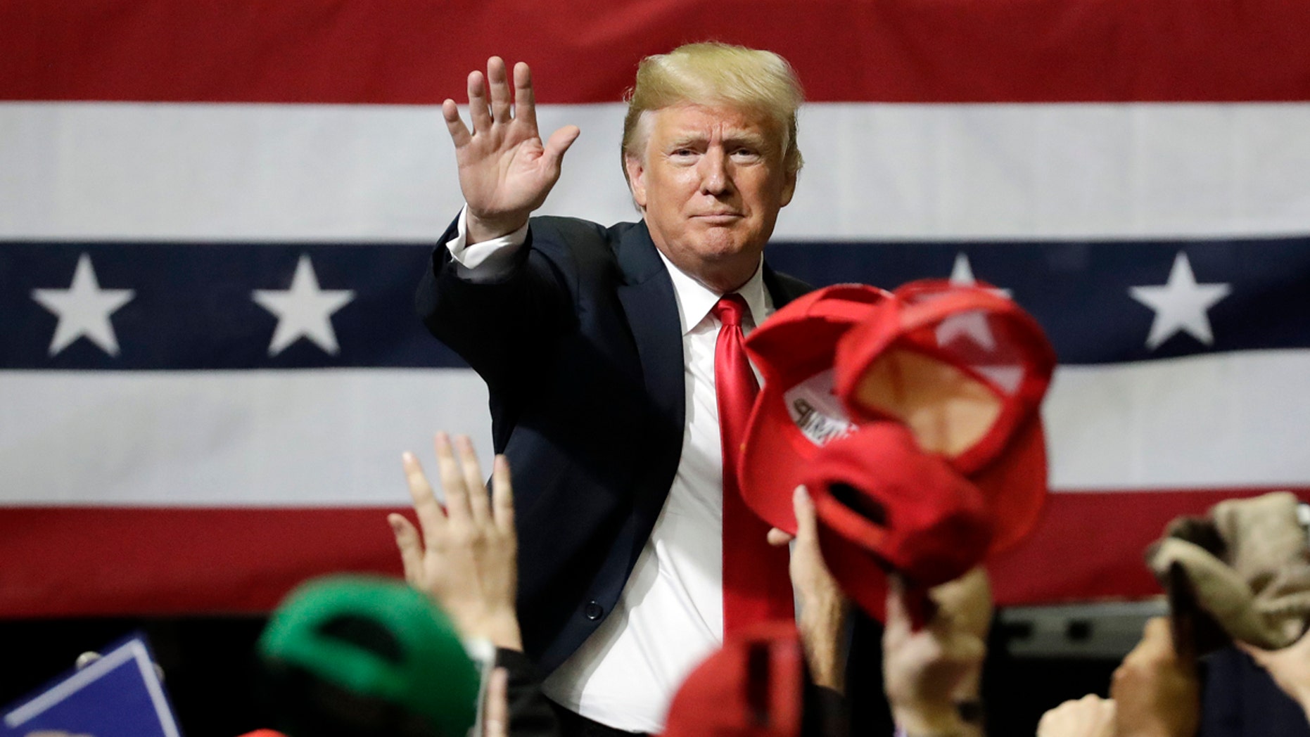 FILE -- President Donald Trump acknowledges the crowd as he leaves a rally Sunday, Nov. 4, 2018, in Chattanooga, Tenn. (AP Photo/Mark Humphrey)