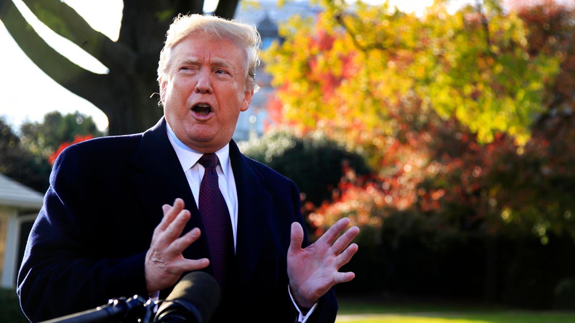 President Donald Trump speaks to the media before leaving the White House in Washington, Tuesday, Nov. 20, 2018, to travel to Florida, where he will spend Thanksgiving at Mar-a-Lago. (AP Photo/Manuel Balce Ceneta)