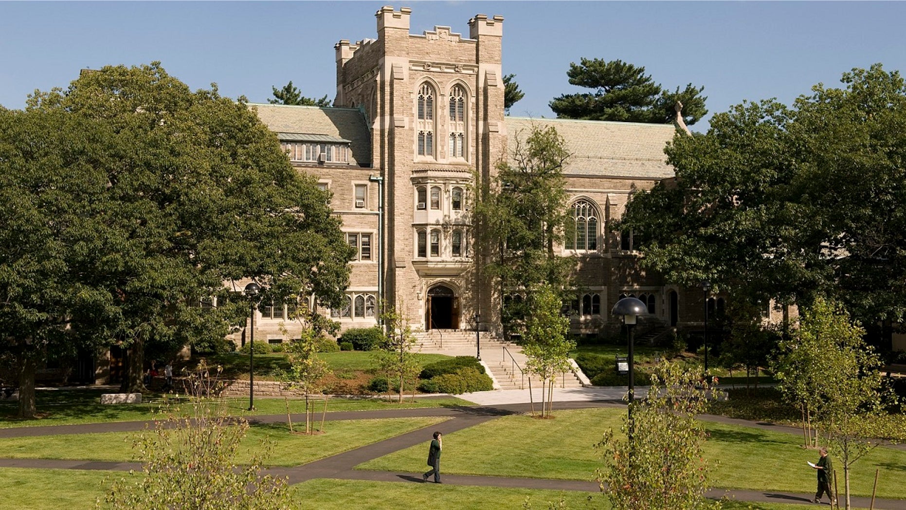 Officials say a 100-year-old oak tree will be removed during a planned renovation of Harvard Divinity School’s Andover Hall.