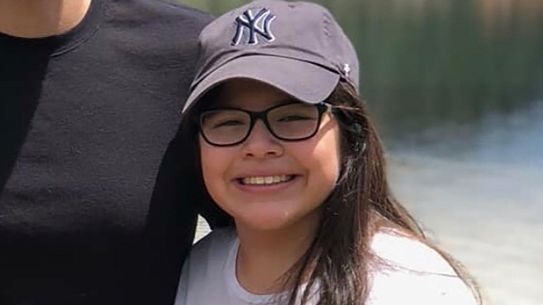 Angie Erives, 11, was fatally shot while seated in the kitchen of her family's North Las Vegas home Thursday night when shooters intent on gang-related retaliation targeted the wrong house, police said.