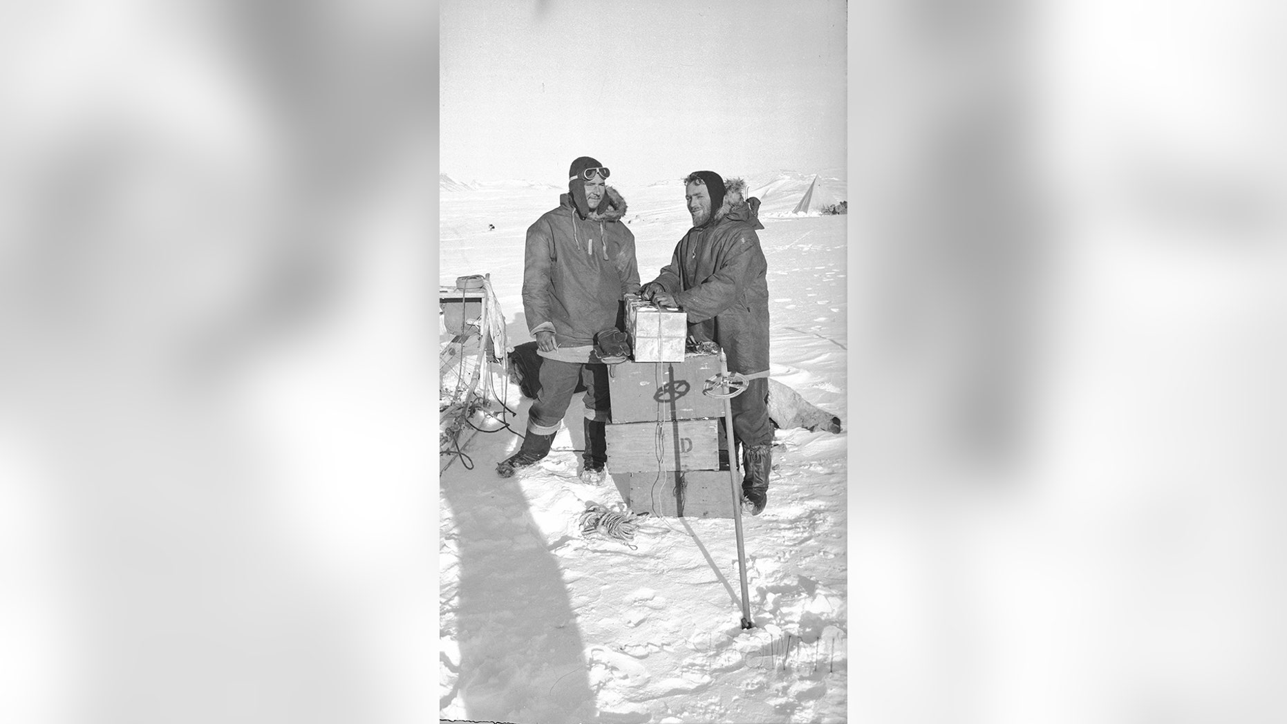 The end of the first sledge journey from Hope Bay: Victor Russell and David James. Launched in 1943, Operation Tabarin was an expedition to secretly establish bases, keep a watchful eye on German and Japanese activities, and curb opportunistic Argentinian incursions. (Credit: Natural Environment Research Council)
